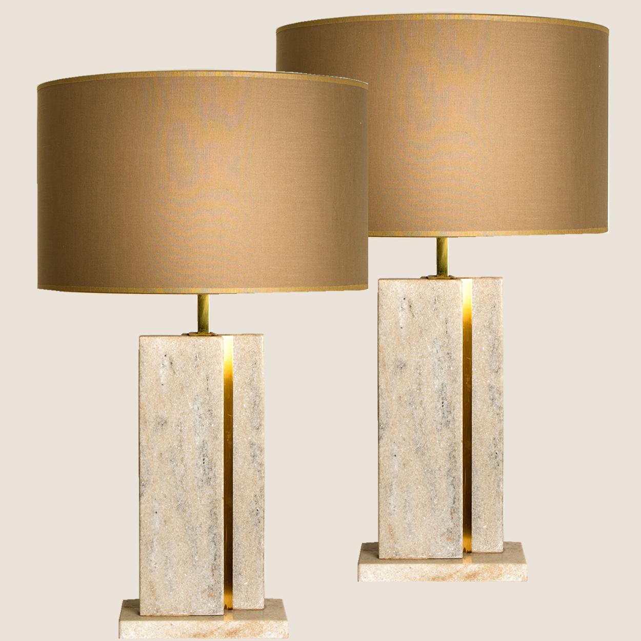 A beautiful table lamp by Camille Breesch, made in 1970 in Belgium, Europe. The rectangular base is made of travertine with brass details. Travertine is a form of limestone and can be found in several places in Europe.

Camille Breesch was an