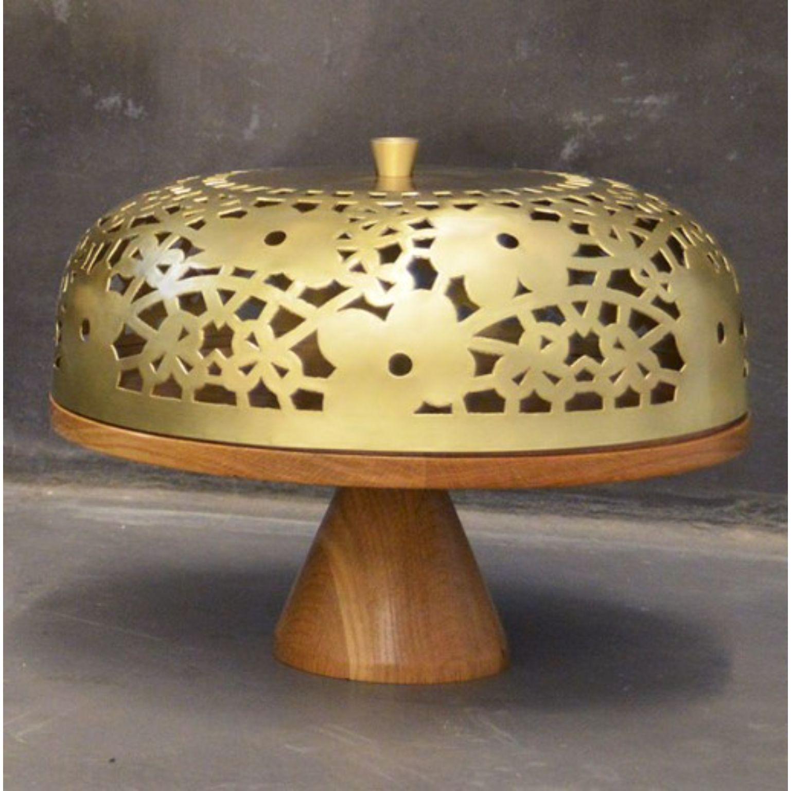 Camille cake stand by Marc Dibeh
2014
Materials: French oak, brass
Dimensions: D 40 x H 35 cm 

Beirut based designer Marc Dibeh narrates his cultural environment through compelling interiors and products.
His studio’s philosophy revolves
