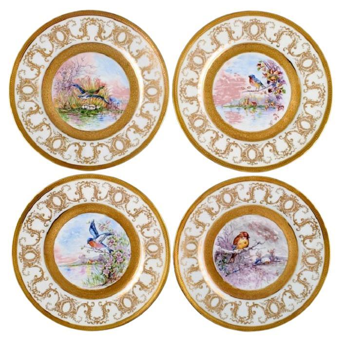 Quatre assiettes décoratives en porcelaine de Camille Tharand pour Limoges, années 1930