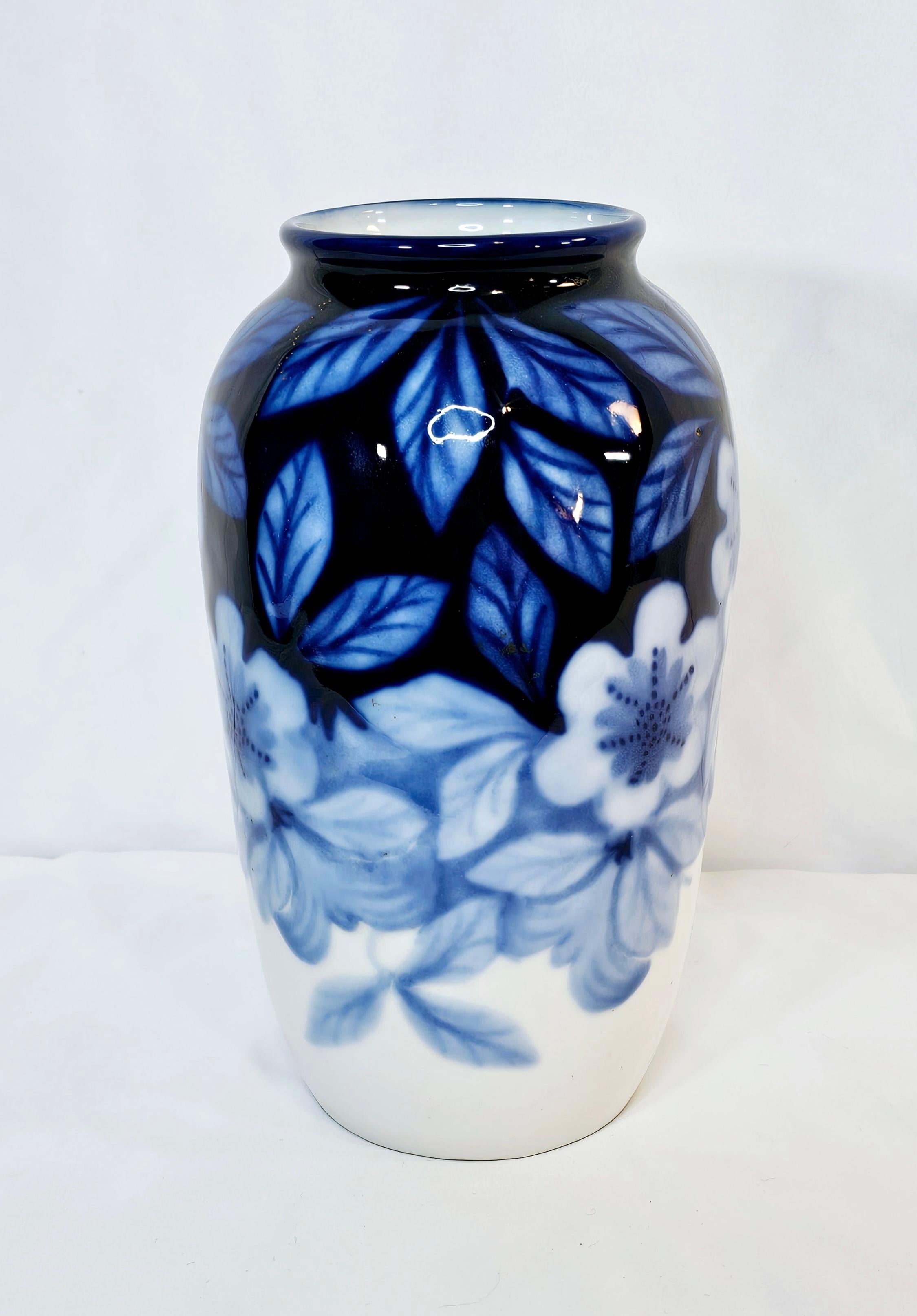Camille Tharaud (French, 1878-1956) For
Limoges Porcelain Vase

DESCRIPTION: Limoges blue and white porcelain
vase by Camille Tharaud porcelain featuring floral
and foliage decorations. Hallmarked on underside
Tharaud was a World War I veteran who,