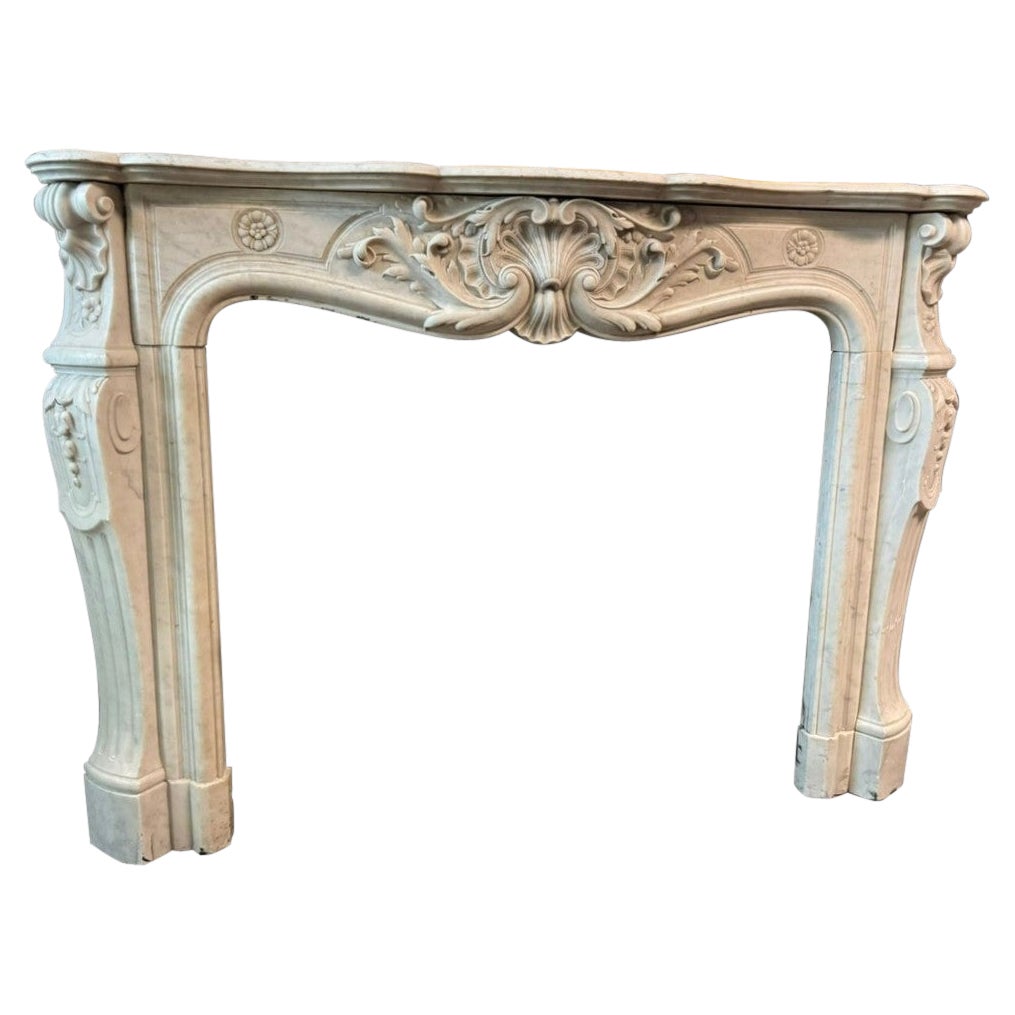White Carrara marble fireplace with a mantelpiece, France
