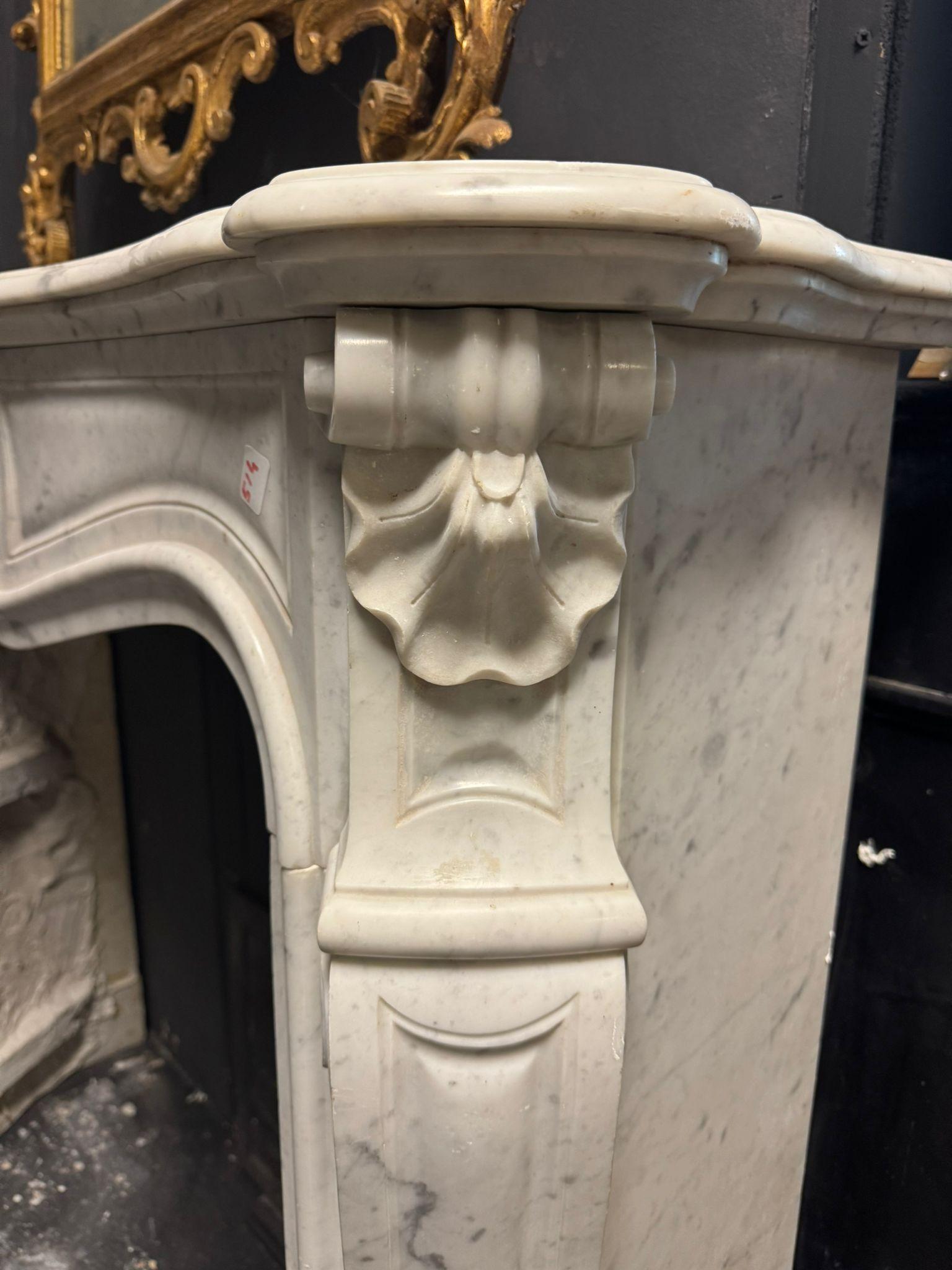 Carved White Carrara marble mantle fireplace, carved with shell, france For Sale