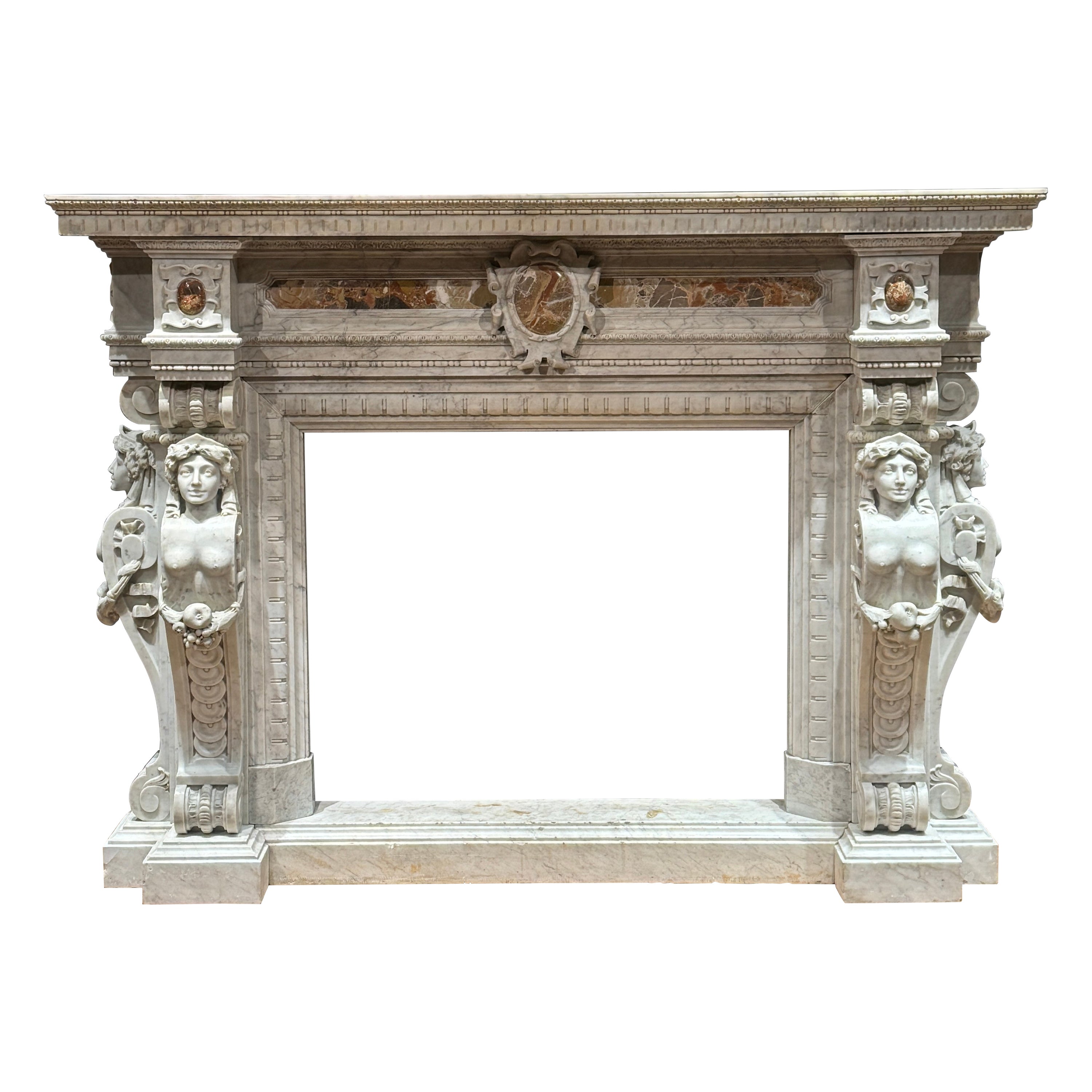 Cheminée en marbre blanc sculpté, inserts en brèche, seconde moitié du XIXe siècle en vente