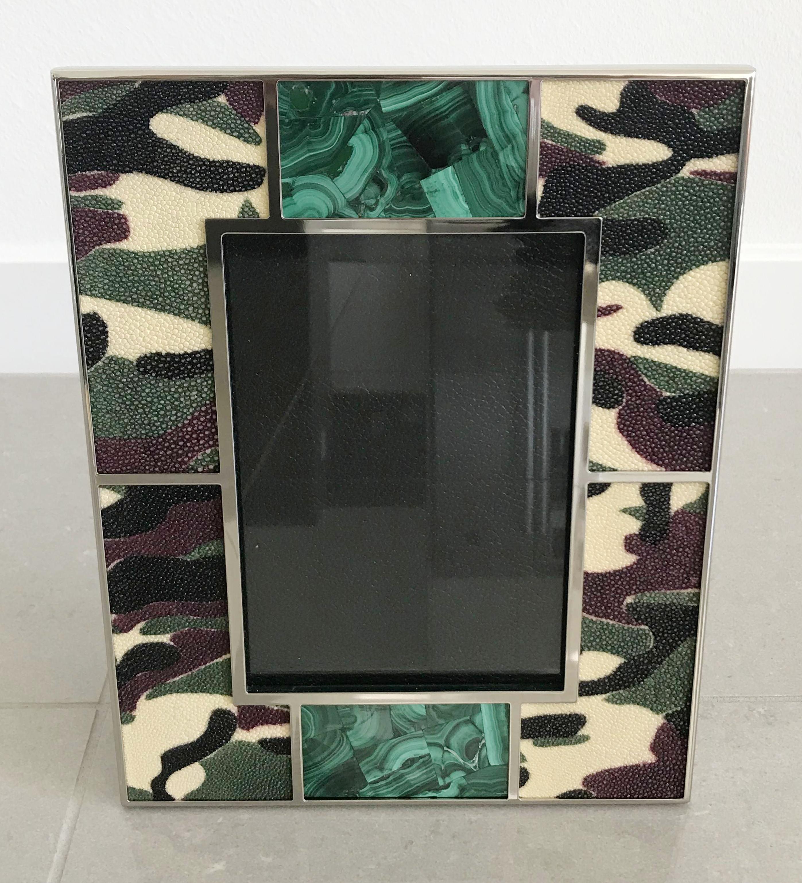Camoflauge colored shagreen leather with malachite inserts and nickel-plated picture frame by Fabio Ltd
Measures: Height 10.5 inches / Width 8.5 inches / Depth 1 inch
Photo size: 5 inches by 7 inches
1 available in stock in Palm Springs currently ON