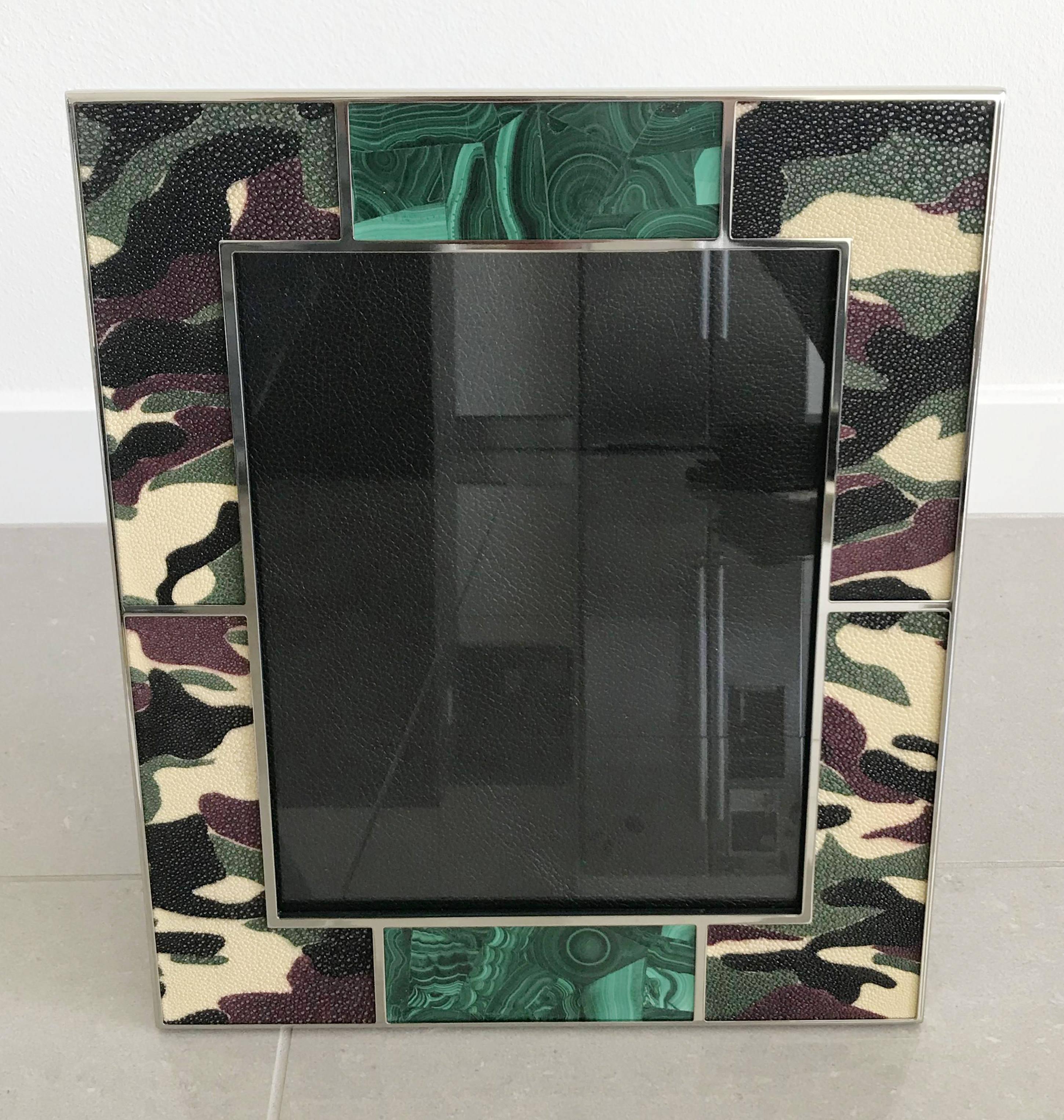 Camoflauge colored shagreen leather with malachite inserts and nickel-plated picture frame by Fabio Ltd
Measures: Height 13.5 inches, width 11.5 inches, depth 1 inch
Photo size: 8 inches by 10 inches
1 available in stock in Palm Springs currently ON