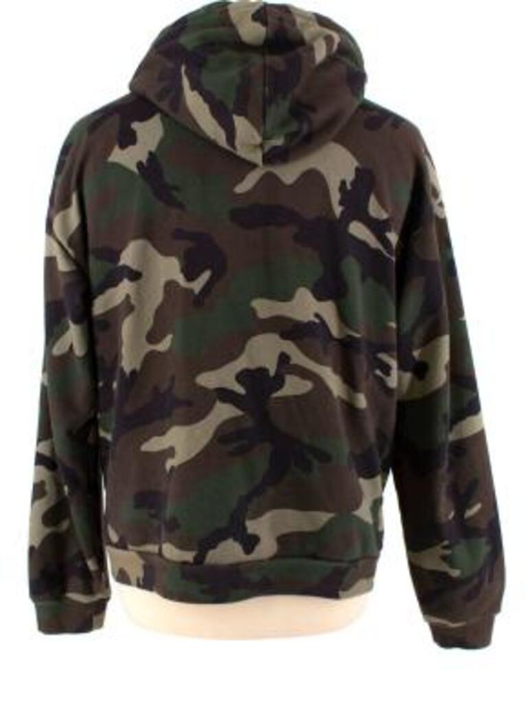 Celine Camouflage Print Cotton Logo Hoodie
 

 - Mid weight, soft cotton body
 - All over camouflage print 
 - Large Celine letter print 
 - Draw string hood
 - Front pocket 
 

 Materials:
 100% Cotton 
 

 Made in Italy 
 

 Hand wash or dry clean
