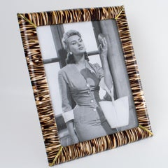 Cornice in vinile rodoide mimetico, Italia circa 1960