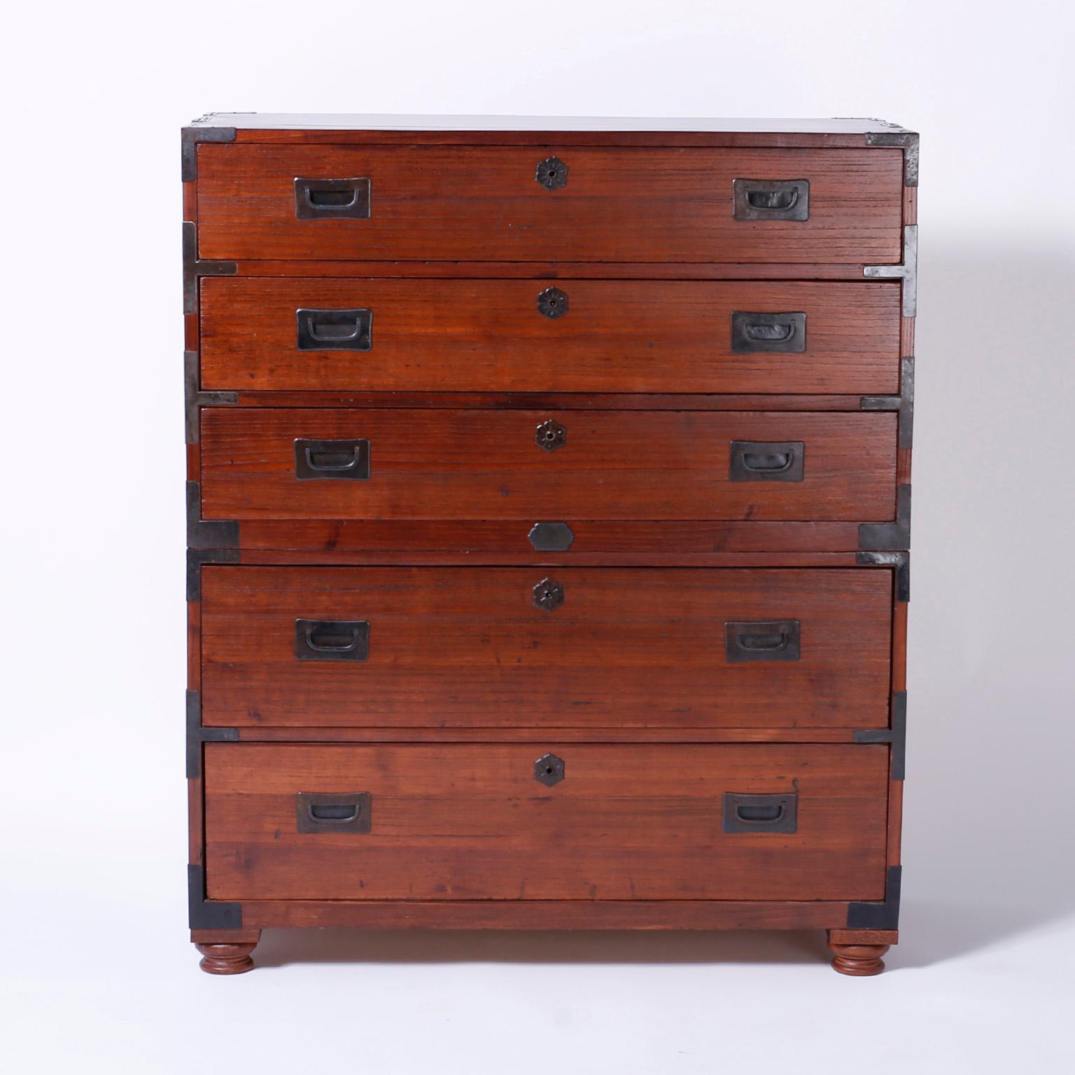 Antique Campaign chest of drawers or tanzu crafted in beautifully grained elmwood with five drawers, hand tooled hardware and a unique blend of Asian and European influences.
