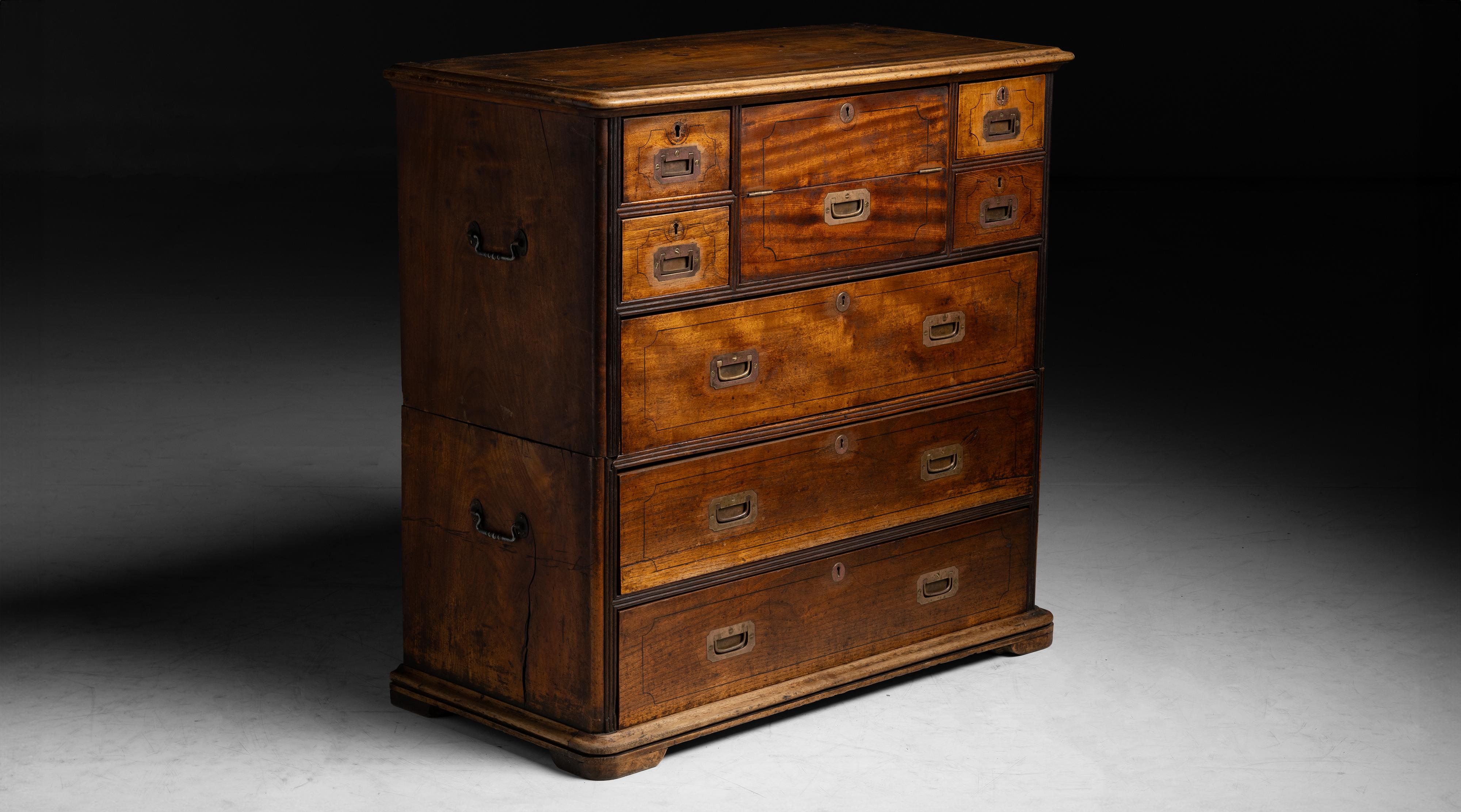 Campaign Chest of Drawers
England circa 1920
Navy chest of drawers with hidden compartments.
38”w x 18.5”d x 35.25”h