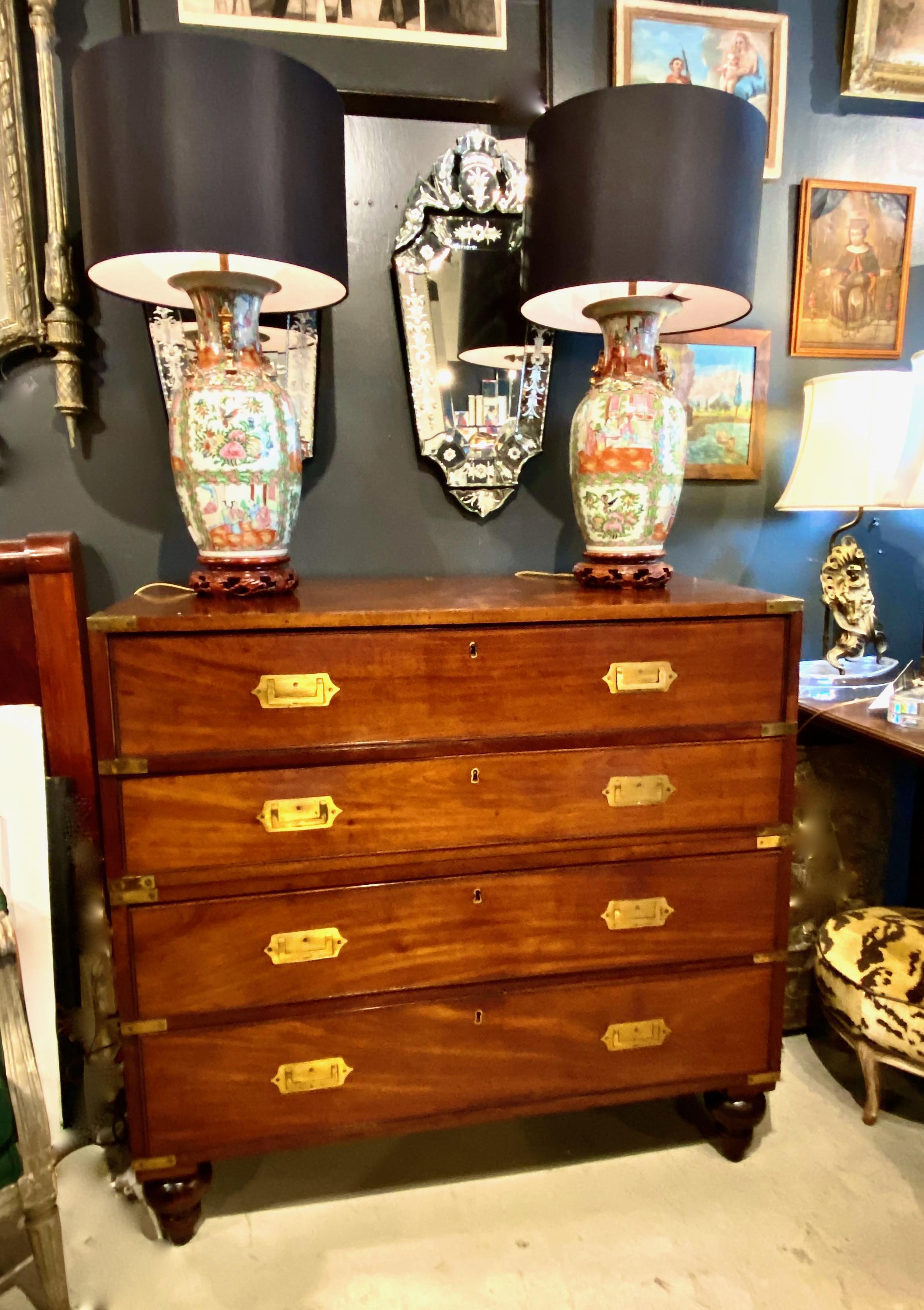 This is an unusual form of 19th century mahogany Campaign chest with writing slide and document section incorporated into the second drawer. The chest is fabricated to the highest standards with cockbeaded drawers and top quality brass fittings. The