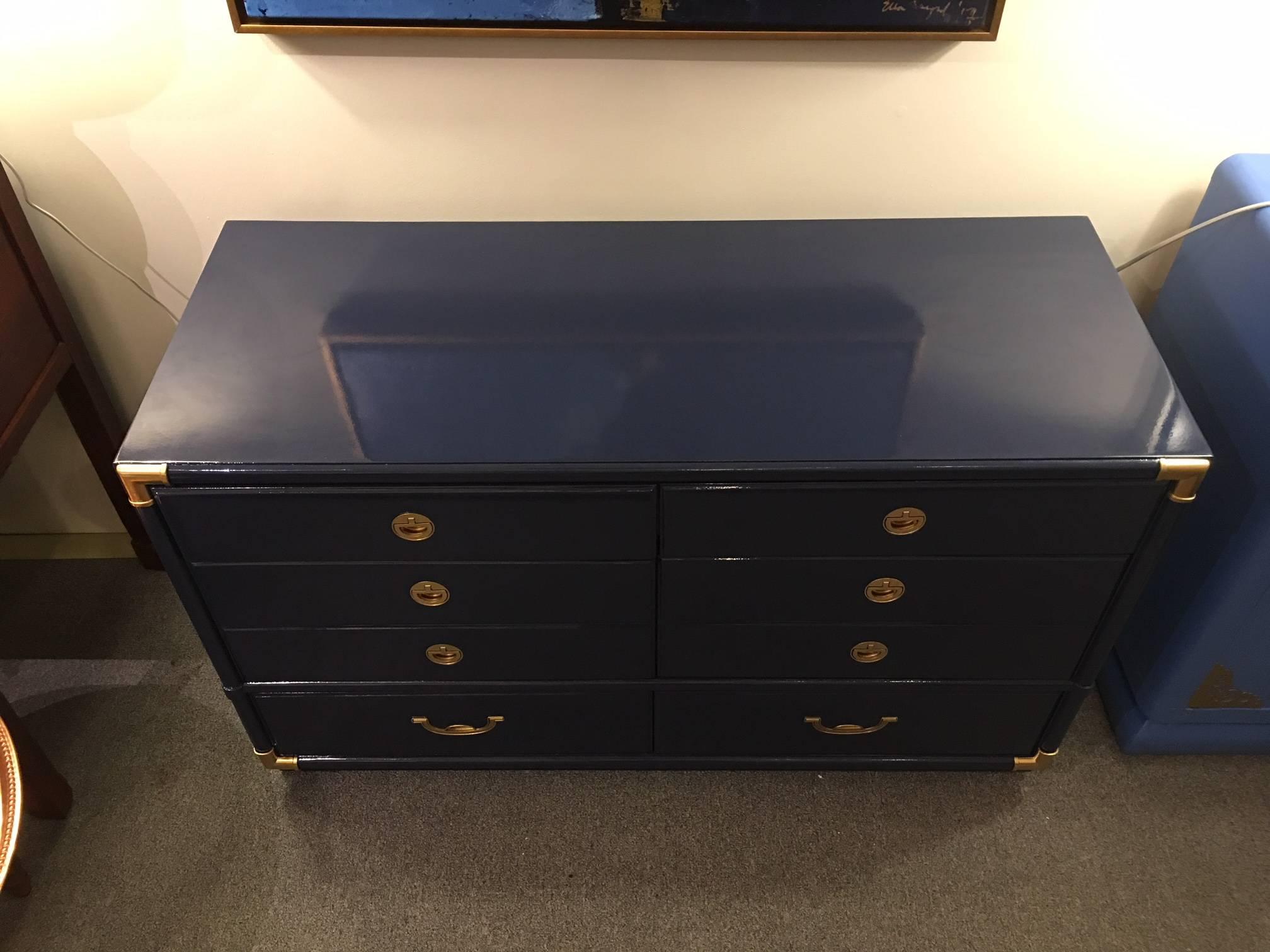 This six-drawer Classic Campaign dresser is dressed in crisp nautical colors of gold and blue and ready for any room in your home. Made by Dixie.
