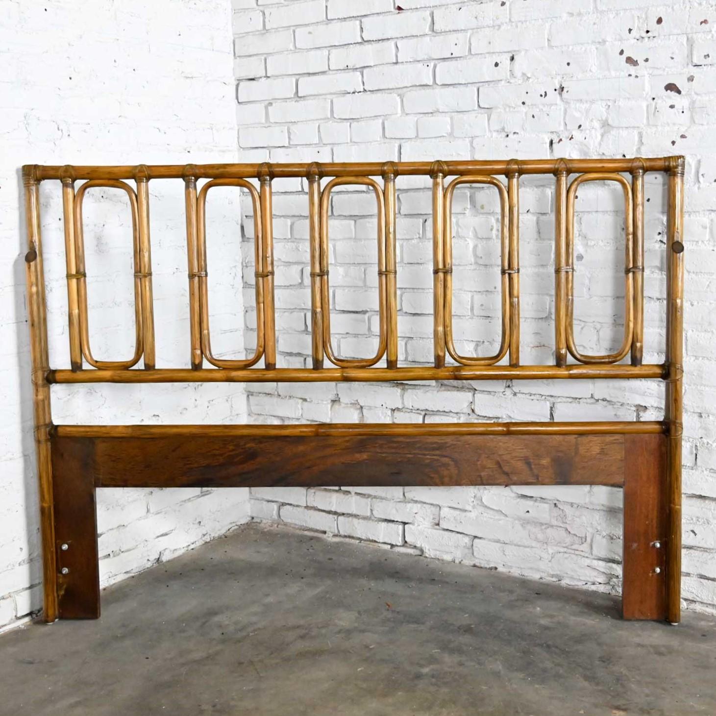 Wonderful vintage Campaign or Chinoiserie Style rattan queen size headboard by McGuire with leather wrap. Beautiful condition, keeping in mind that this is vintage and not new so will have signs of use and wear. Please see photos and zoom in for