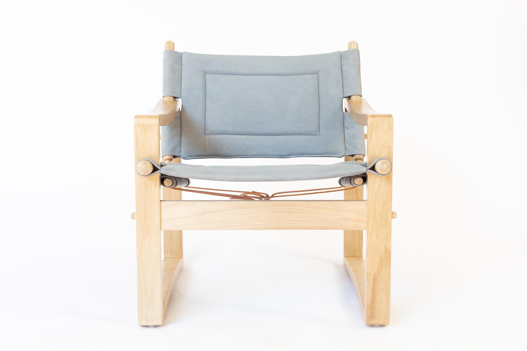 The Campaign Safari chair is a reference to Danish furniture mid-century design from the 1960s with its simple and gracefully curved frame. Upholstered with a sling seat affixed with sturdy leather straps, the chair is meticulously constructed with