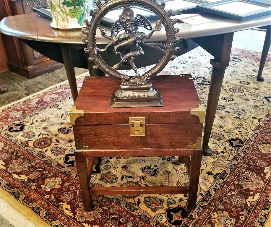 Presenting a gorgeous and beautifully proportioned Campaign style box on stand.

Early to mid-20th century, probably made in Indonesia.

Perfect as a side table for a sofa or just for use as a side cabinet for storage.

The box is permanently