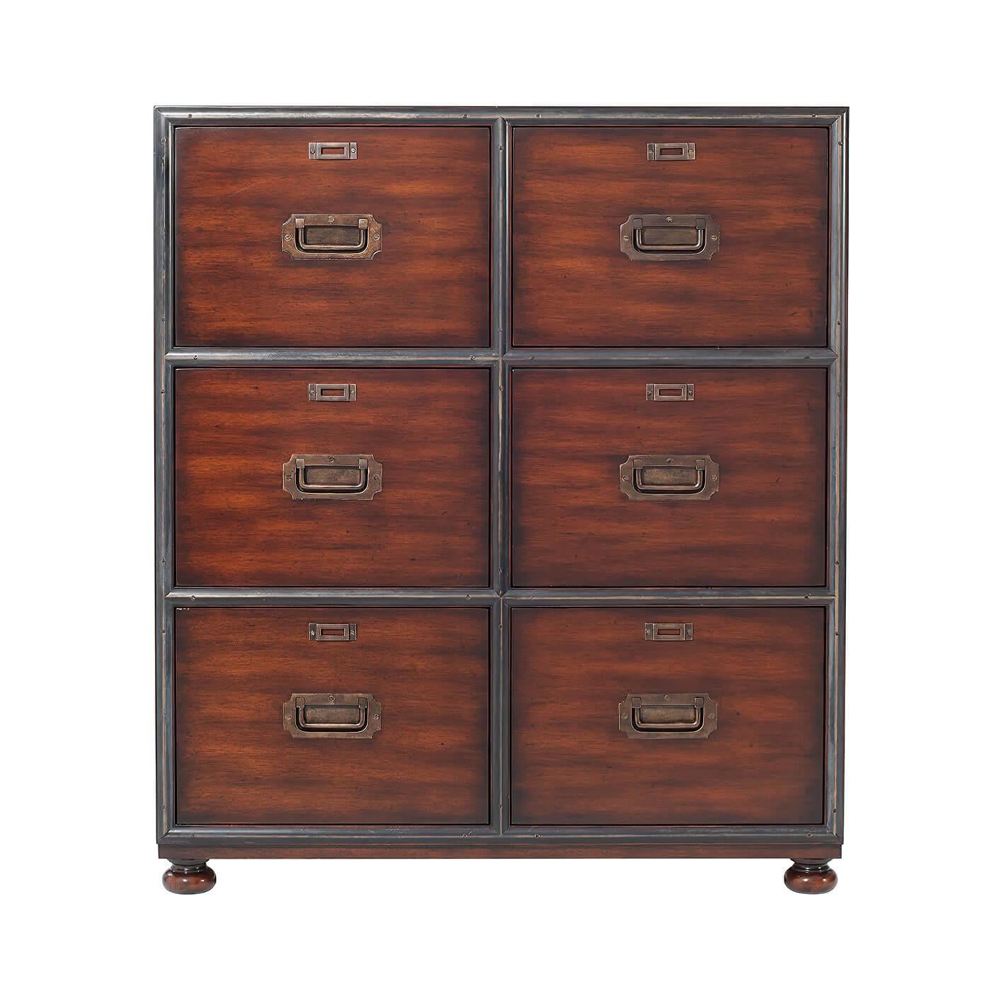 A Campaign style six drawer chest or filing cabinet. Fits A4 and letter hanging folders. With brass hardware, drawers on runners and raised on bun feet.
Dimensions: 34.25