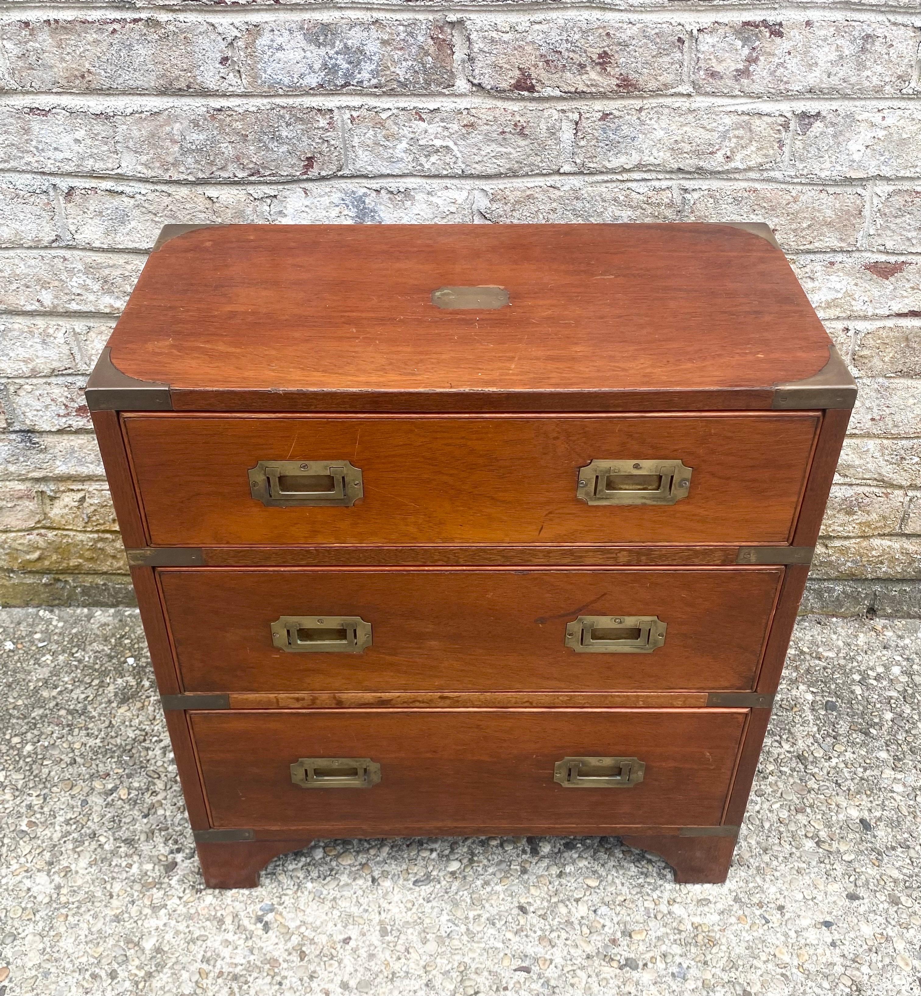 Campaign style nightstand small chest. Brass details.