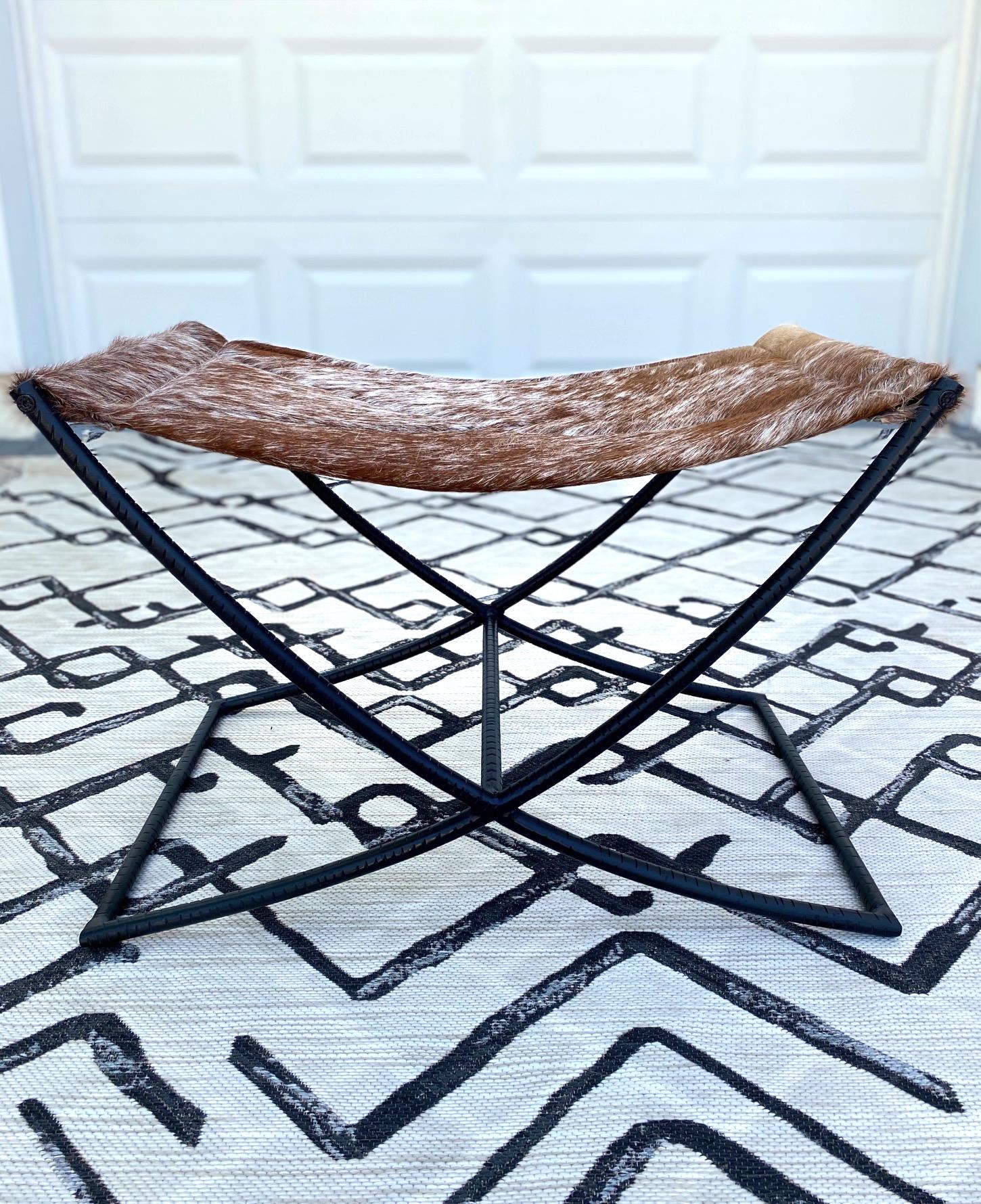 Campaign Style Stool with Brown and White Cowhide Seat and Black Iron Base 5