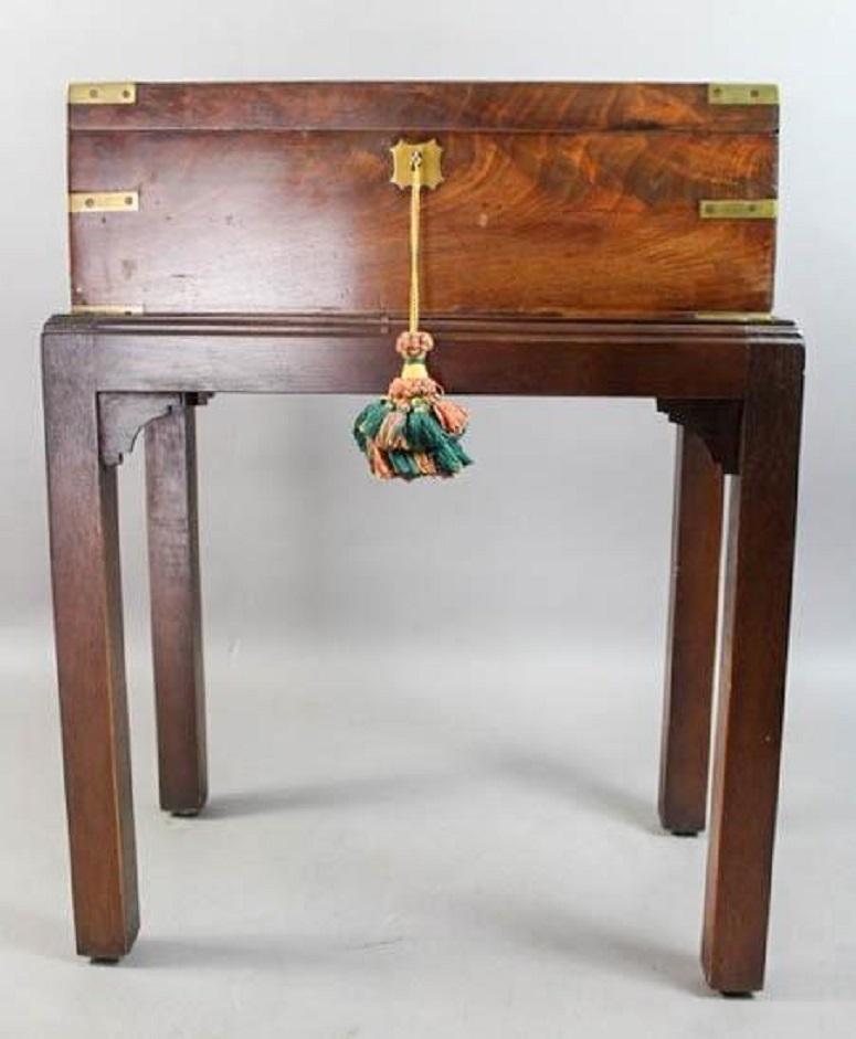 Campaign wood travelling lap desk on a later stand, 19th century.