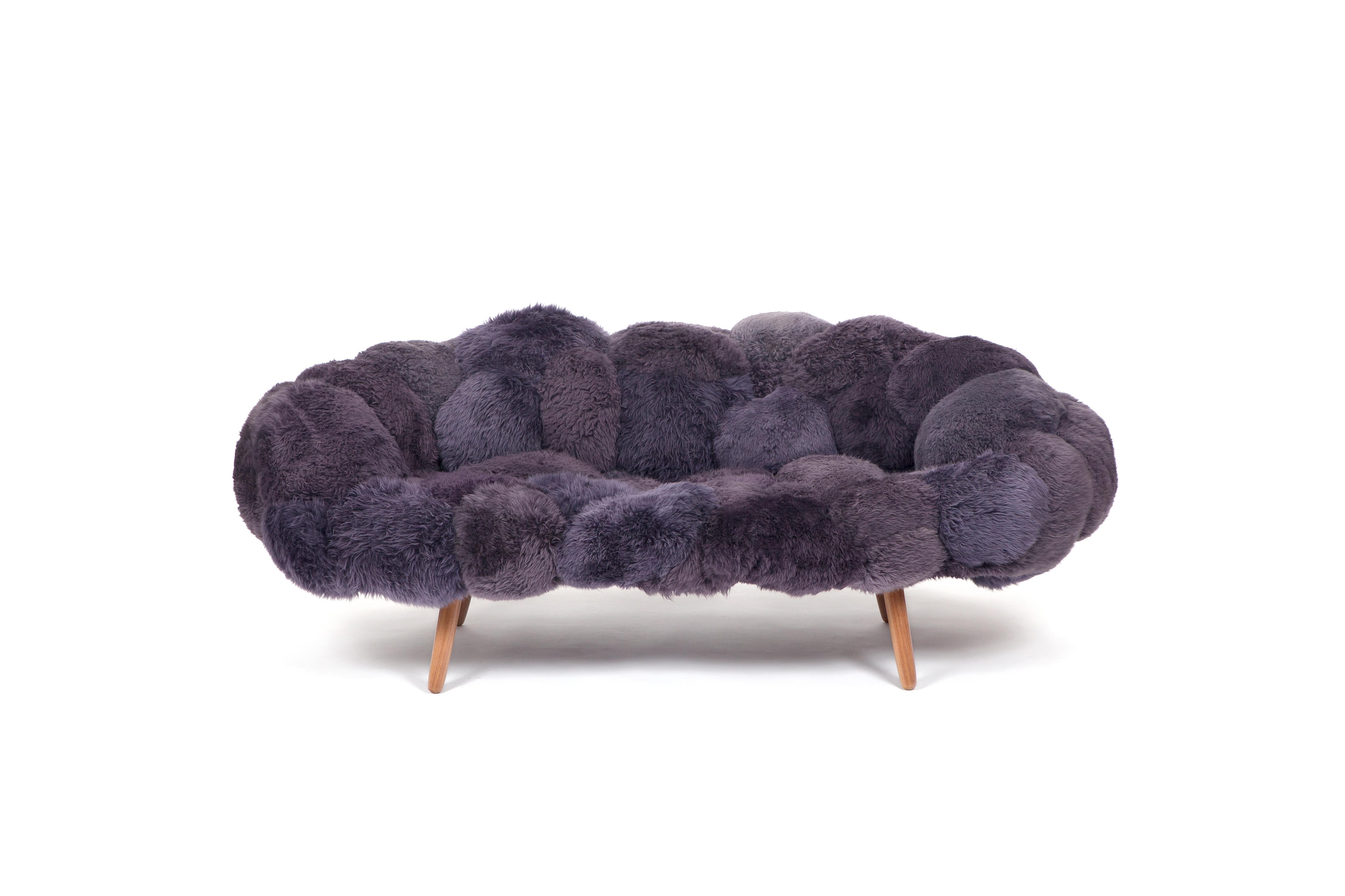 Fernando and Humberto Campana [Brazilian, b. 1961, 1953]
Bolotas sofa (Mauve), 2015
Sheep's wool and Ipê wood
Measures: 33.5 x 78.75 x 35.5 inches
85 x 200 x 90 cm

The Campana Brothers, Fernando (b. 1961) and Humberto (b. 1953) were born in