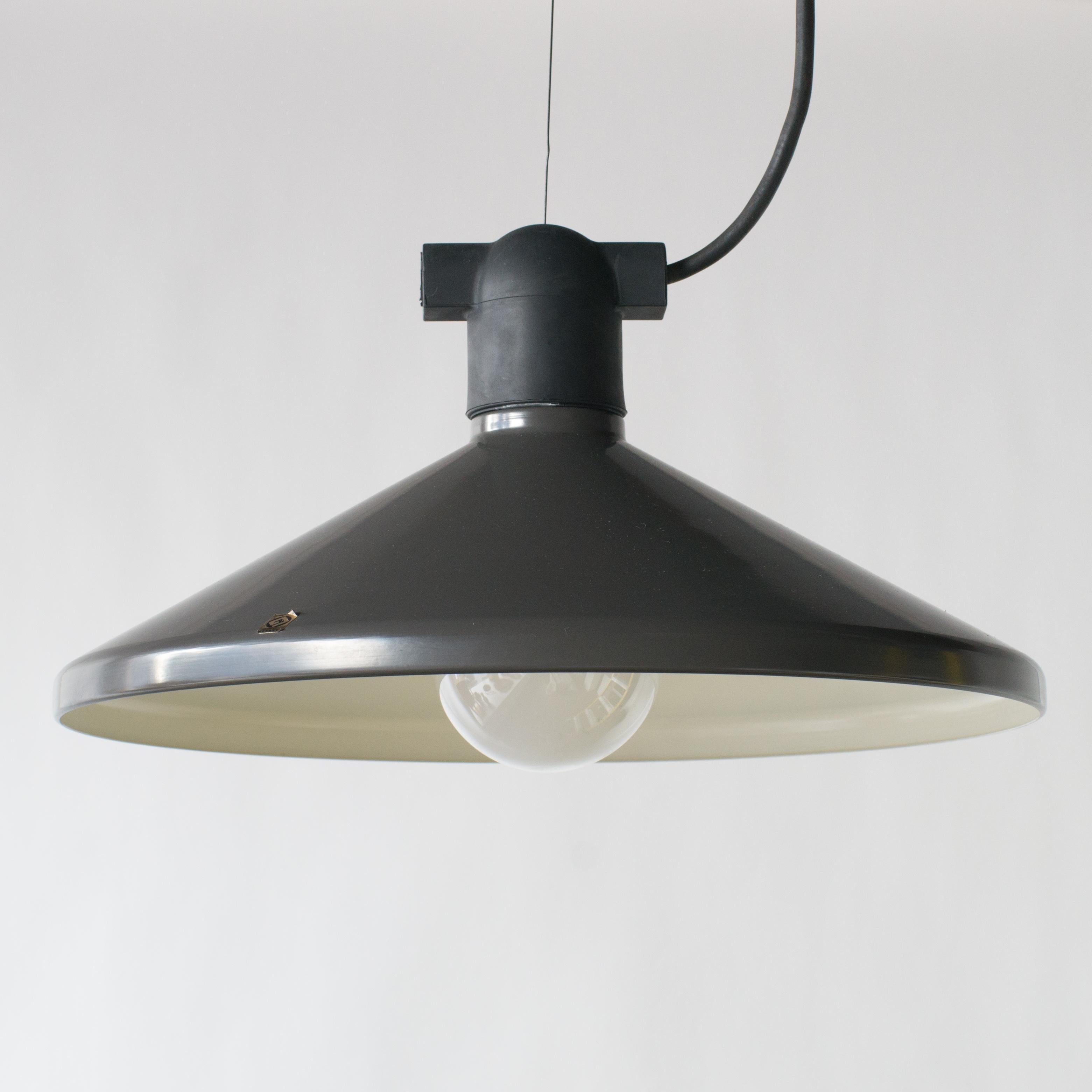 Campana pendant lamp designed by Masayuki Kurokawa for Yamagiwa. Made of steel and rubber lim. Painted in dark grey.