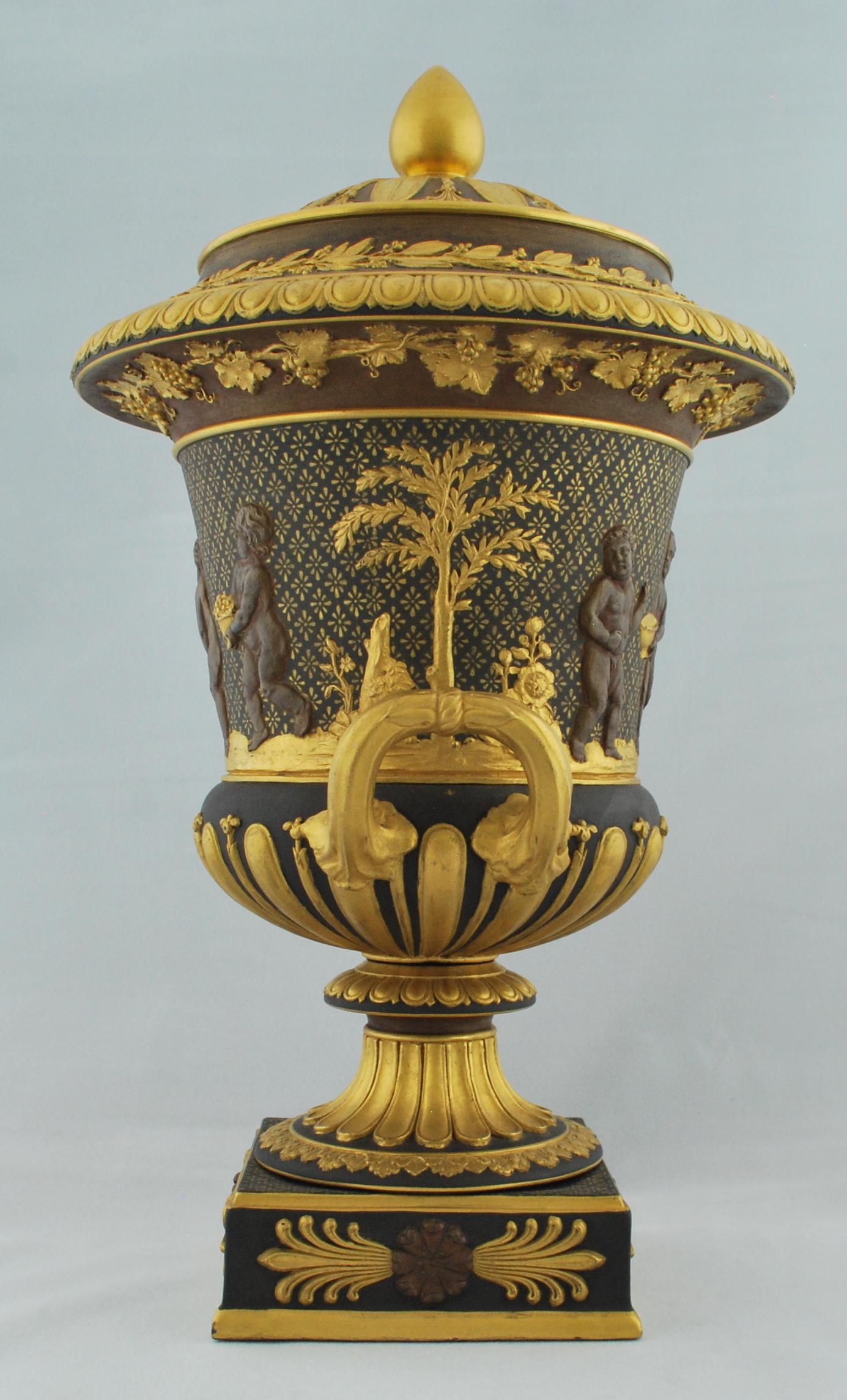 An unusually large example of a scarce form of decoration. The vase is bronzed and gilded, in imitation of Japanese bronzes of the period.

   