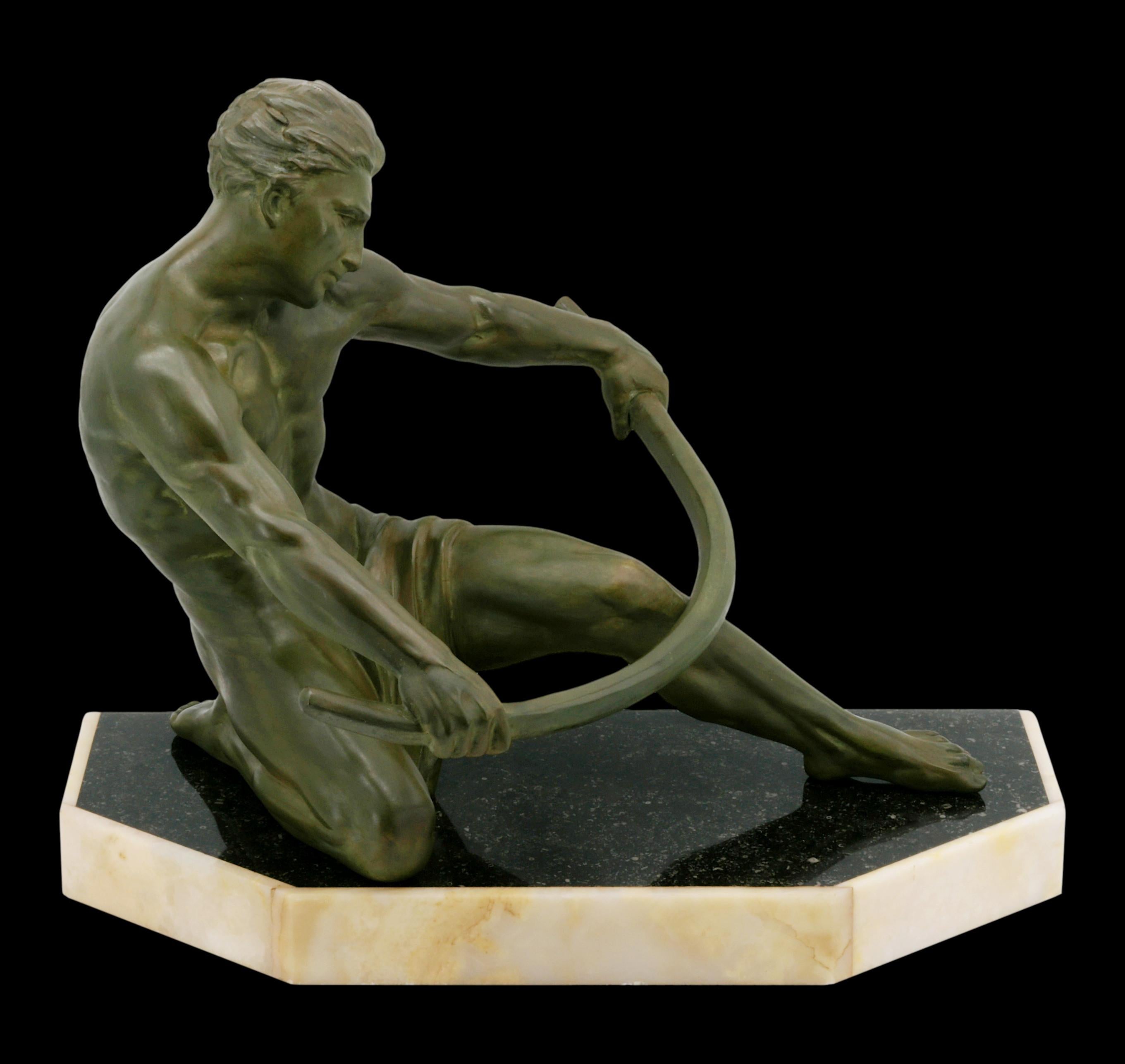 A striking French Art Deco sculpture of a man by Campbell, created in France ca.1920. Crafted from spelter, marble, and onyx, this impressive piece showcases the bold, dynamic style typical of the Art Deco period. The sculpture is signed on the