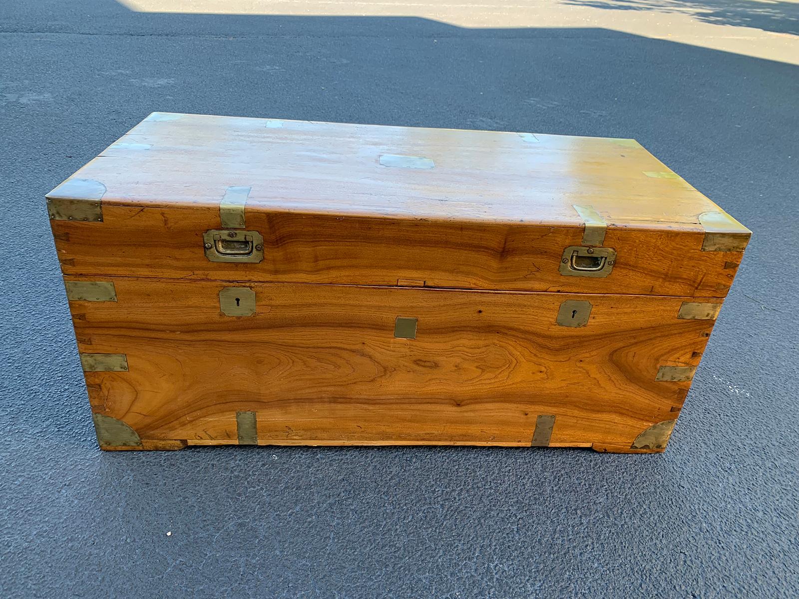 Camphor wood and brass campaign trunk, circa 1820s.