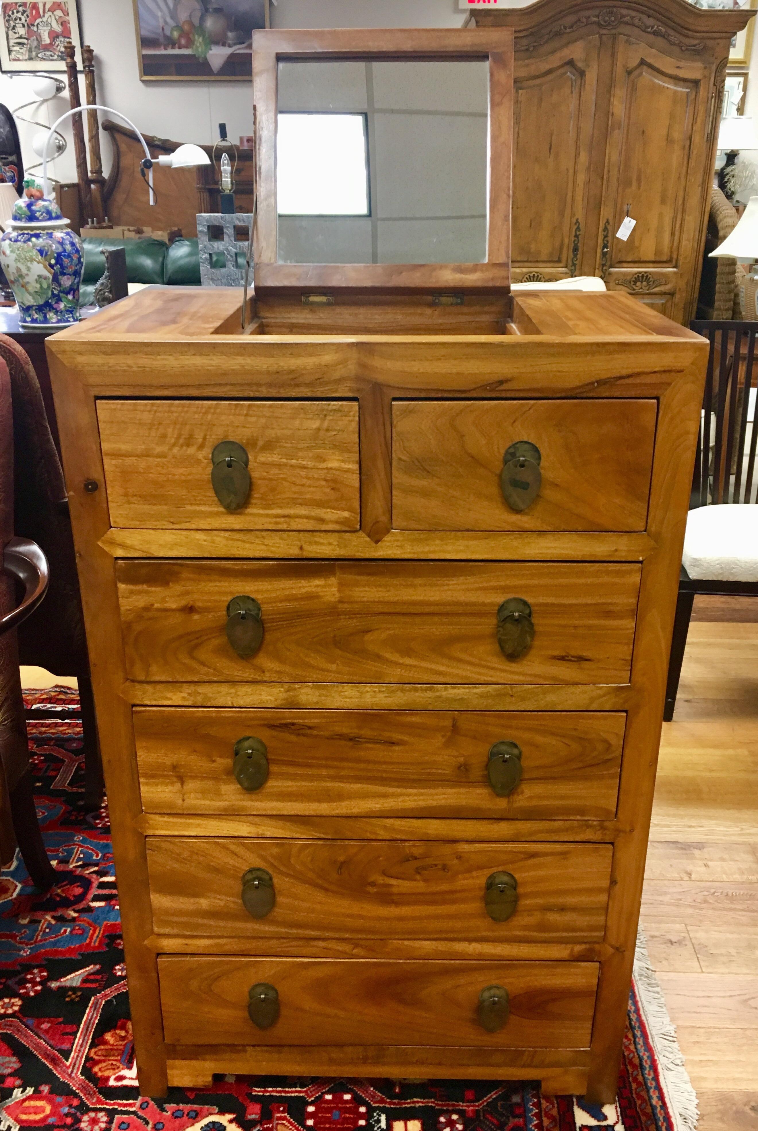 Sumptuous camphor wood British Officer’s chest of drawers with original hardware. What distinguishes this piece is the pop up mirror and camphor wood. Drawers from top to bottom.