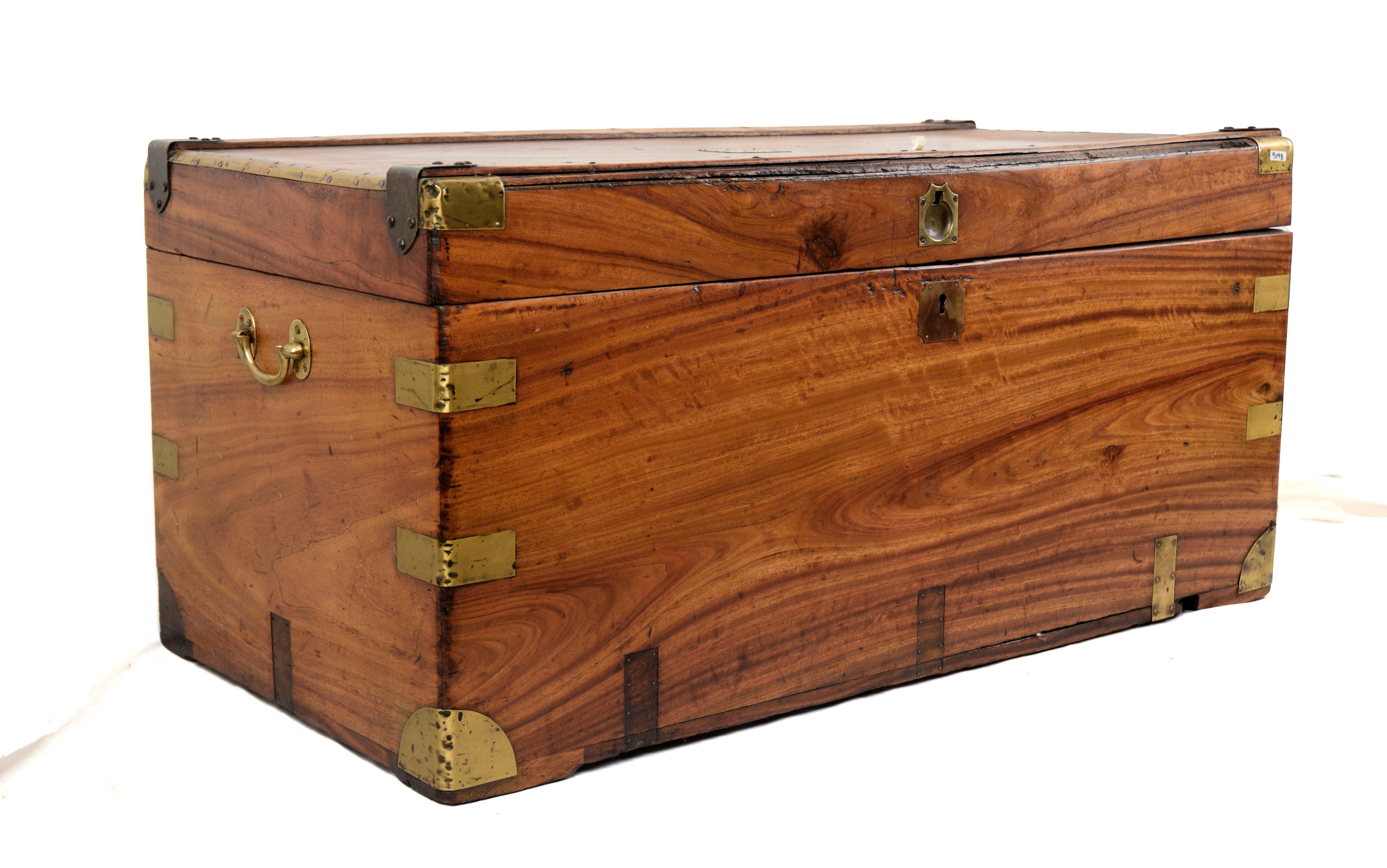 Camphorwood Campaign Chest - Late 19th Century Chinese Export Case (Medium)

This hardwood chest has brass hardware, including handles. It has a brass plaque on the top that has been inscribed with the owner's name,  R. B. Van Cleave, but this one