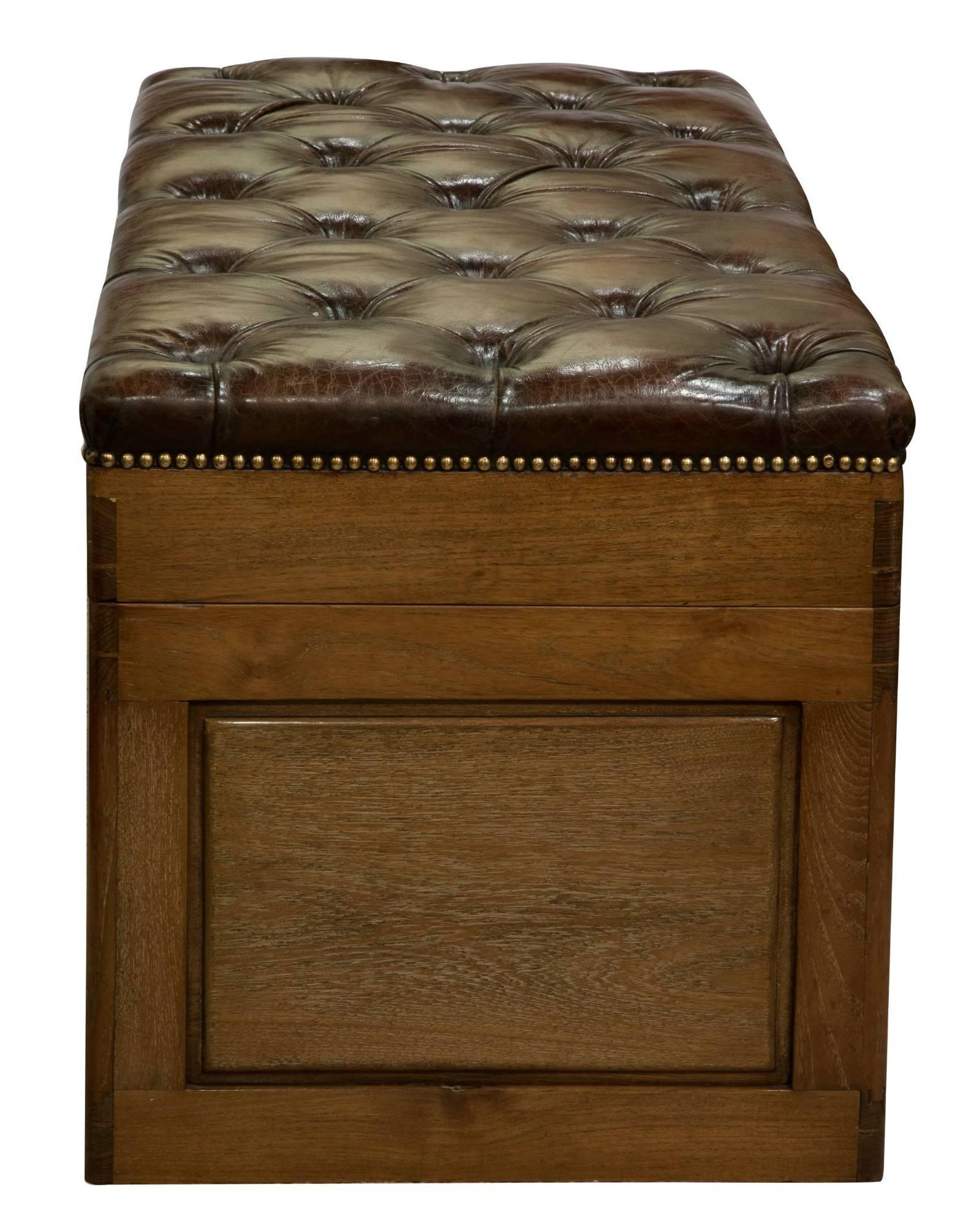Camphorwood trunk with deep button leather top.