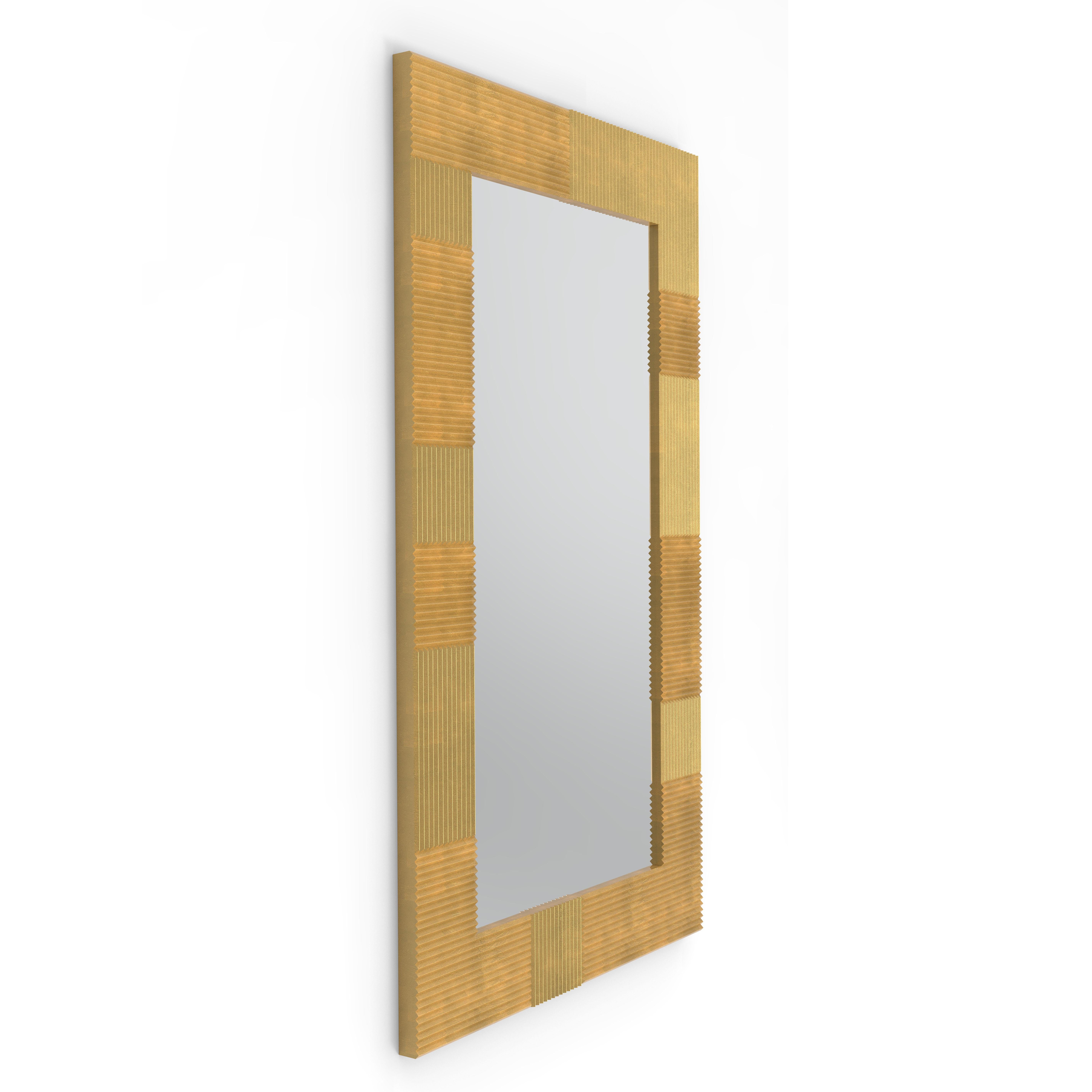 Mirror with machining done by CNC machine but finishing and sanding by hand. Available in square or rectangular variants in white, black or hand-stretched gold leaf