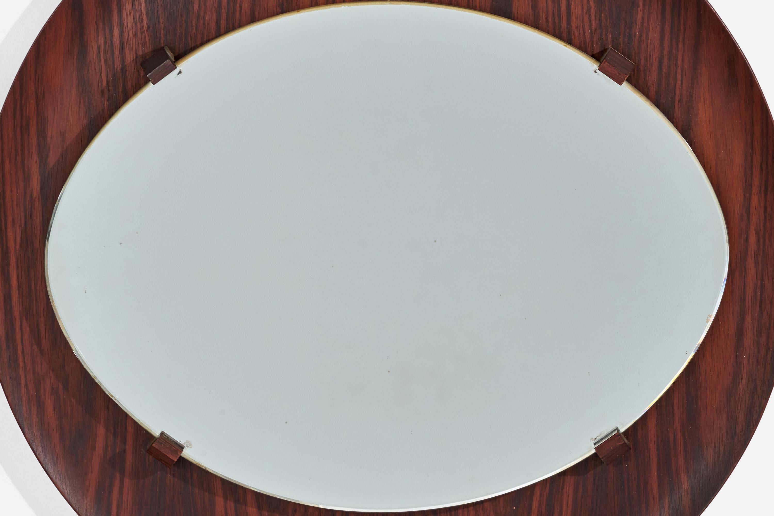 A rosewood wall mirror; design attributed to Franco Campo and Carlo Graffi and presumably produced by Home, Italy, 1950s.