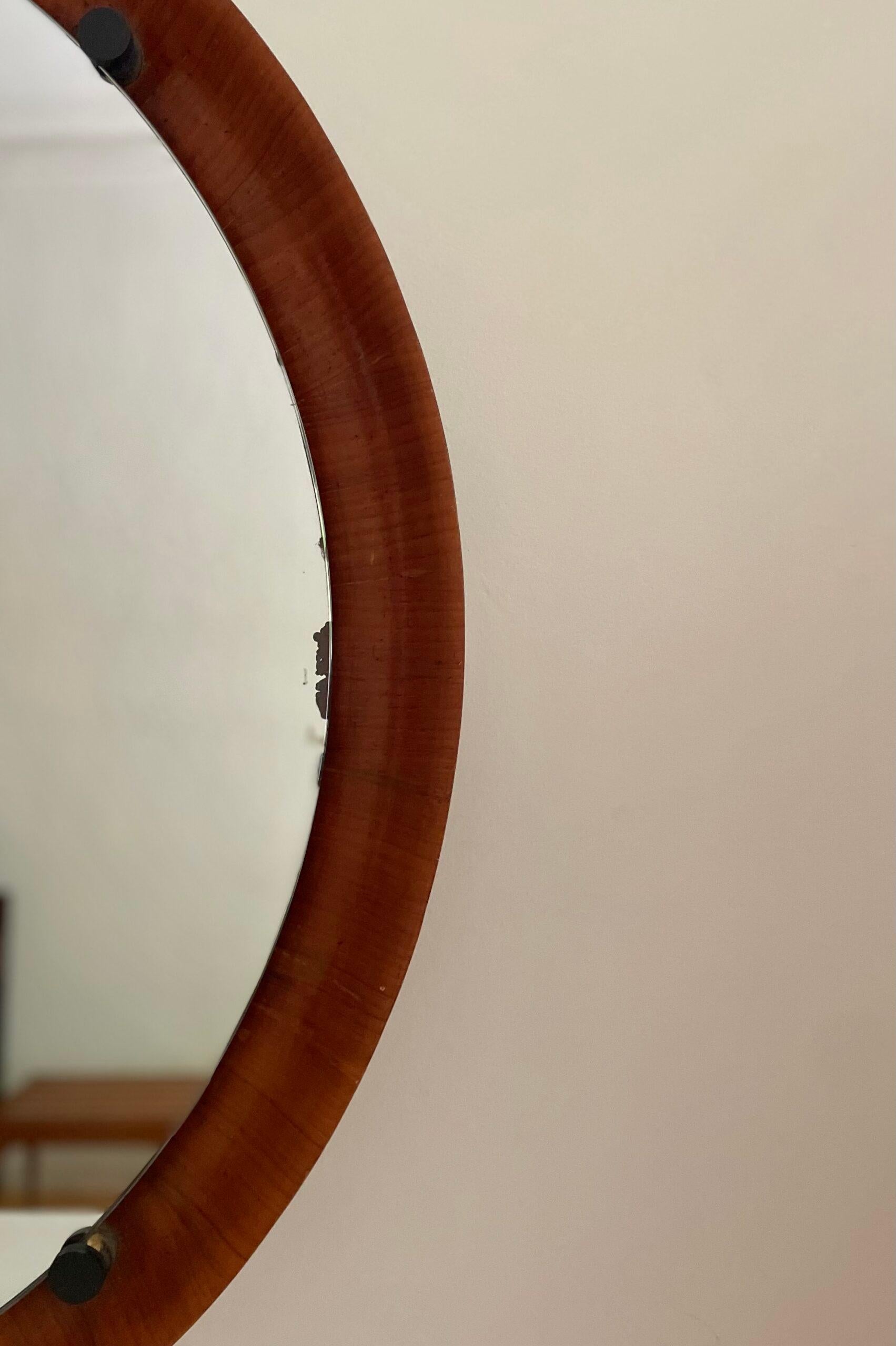 Teak mirror designed by Franco Campo and Carlo Graffi. Italy, 1960s.

