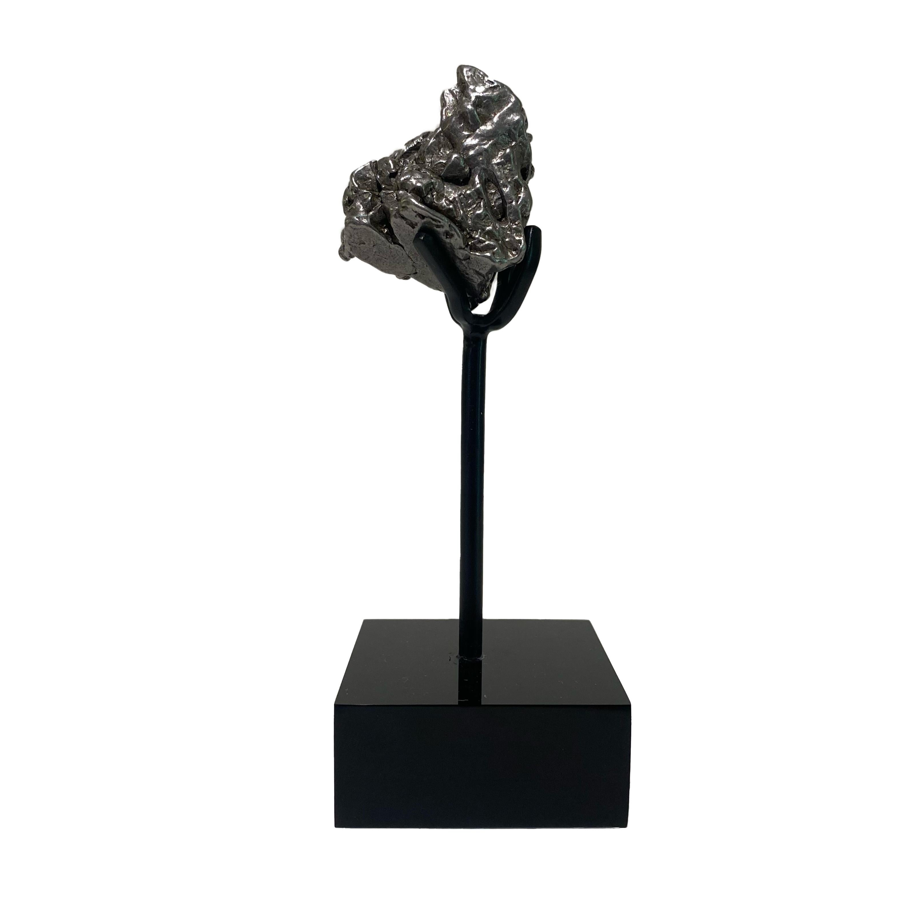 Campo del Cielo Space Rock

Approximately 4.5 billion years old
13 x 3.5 x 4.5 cm
Buenos Aires, Argentina
Bespoke stand included

Campo del Cielo (‘Valley of the Sky’) meteorites formed as the result of two asteroids colliding at cosmic velocity in
