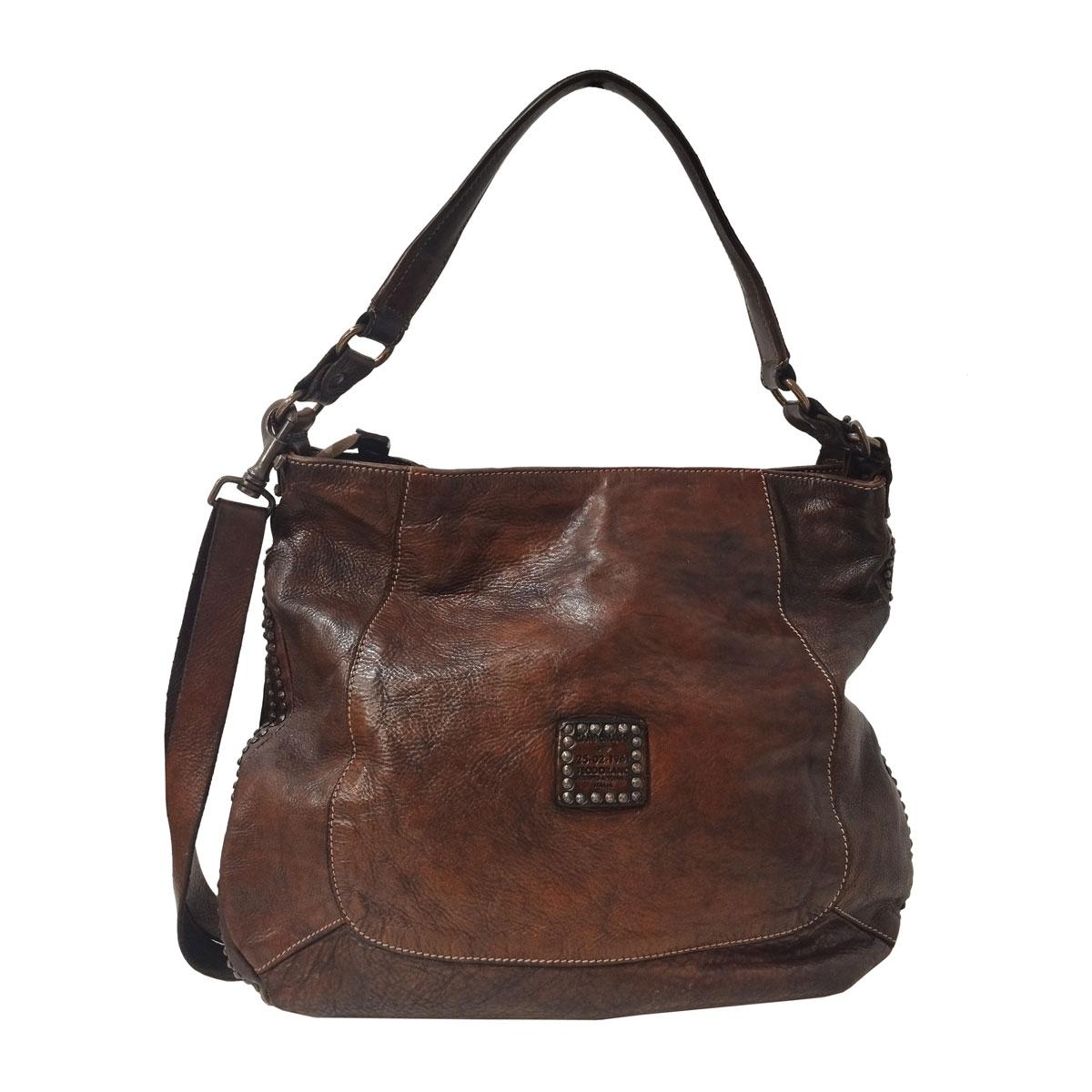 Beautiful and easy to wear italian manufactured bag
Leather bag from Campomaggi Italy
Brown color
Studded
Can be carried on shoulder or crossbody
Zip closure
Internal zip pocket and phone holder
Cm 38 x 35 (14,9 x13,77 inches)
With dustbag
Fast