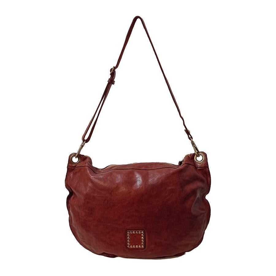 Leather Leather color Braided on front One internal zip pocket Cm 42 x 30 (16,53 x 11,81 inches) With dustbag

