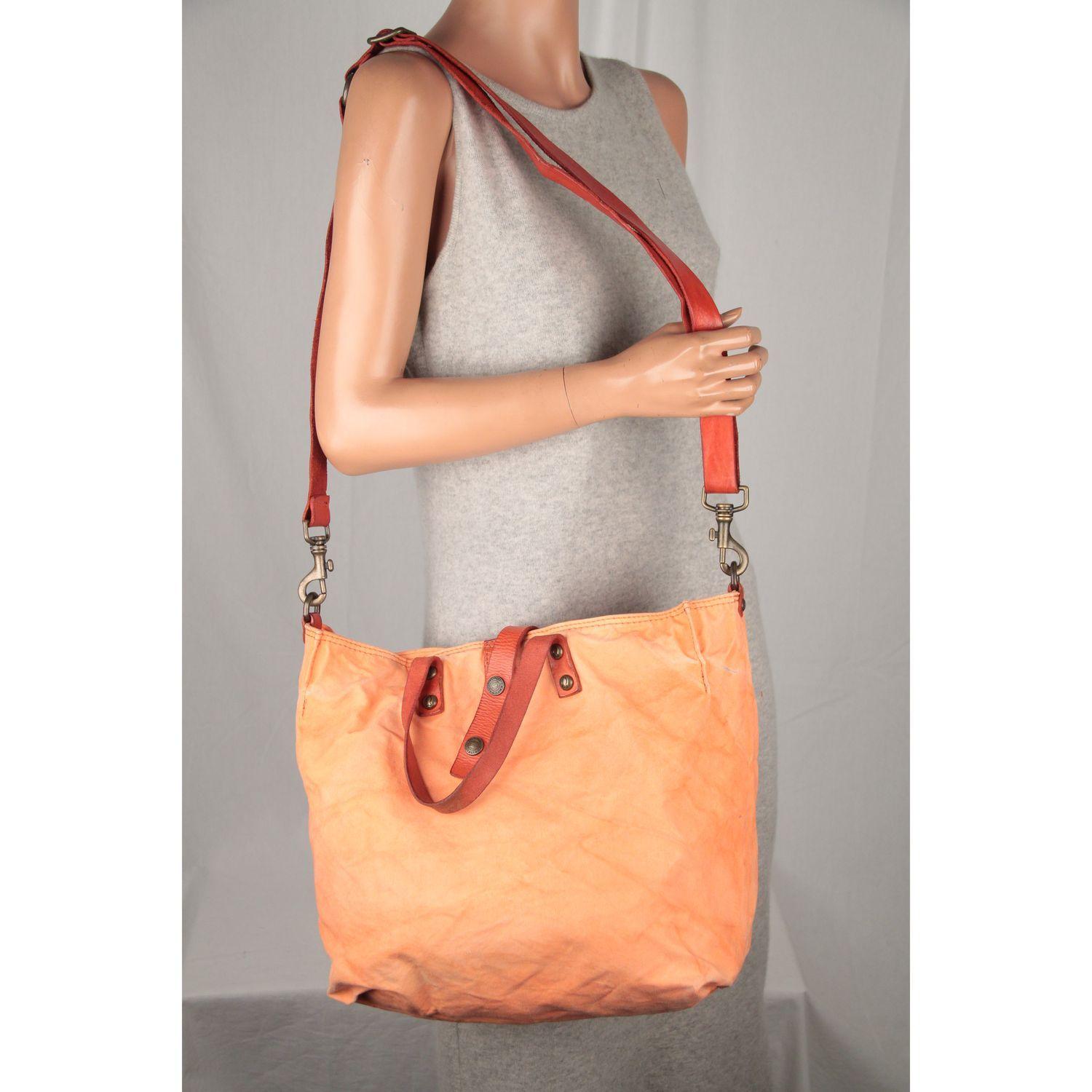 MATERIAL: Leather COLOR: Orange MODEL: Tote GENDER: For Her SIZE: Large Condition CONDITION DETAILS: C: FAIR CONDITION - Well used, with noticeable defects - Canvas has faded due to normal use. Some darkness and creases on canvas due to normal use.