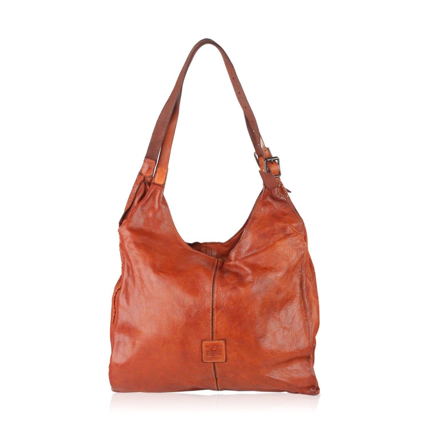MATERIAL: Leather COLOR: Brown MODEL: Hobo GENDER: Women SIZE: Medium Condition CONDITION DETAILS: B :GOOD CONDITION - Some light wear of use - some darkness on leather due to normal use (especially on the upper part of the bag), some light pilling