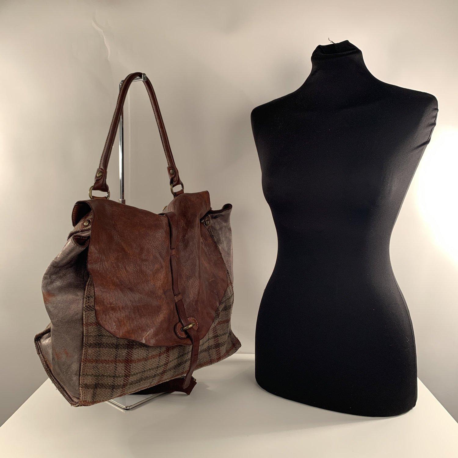 MATERIAL: Wool, Leather COLOR: Brown MODEL: Tote GENDER: For Her SIZE: Large Condition B - VERY GOOD Some normal wear of use on leather. Some pilling on wool fabric. Some normal wear of use on the internal lining Measurements BAG HEIGHT: 13 inches -