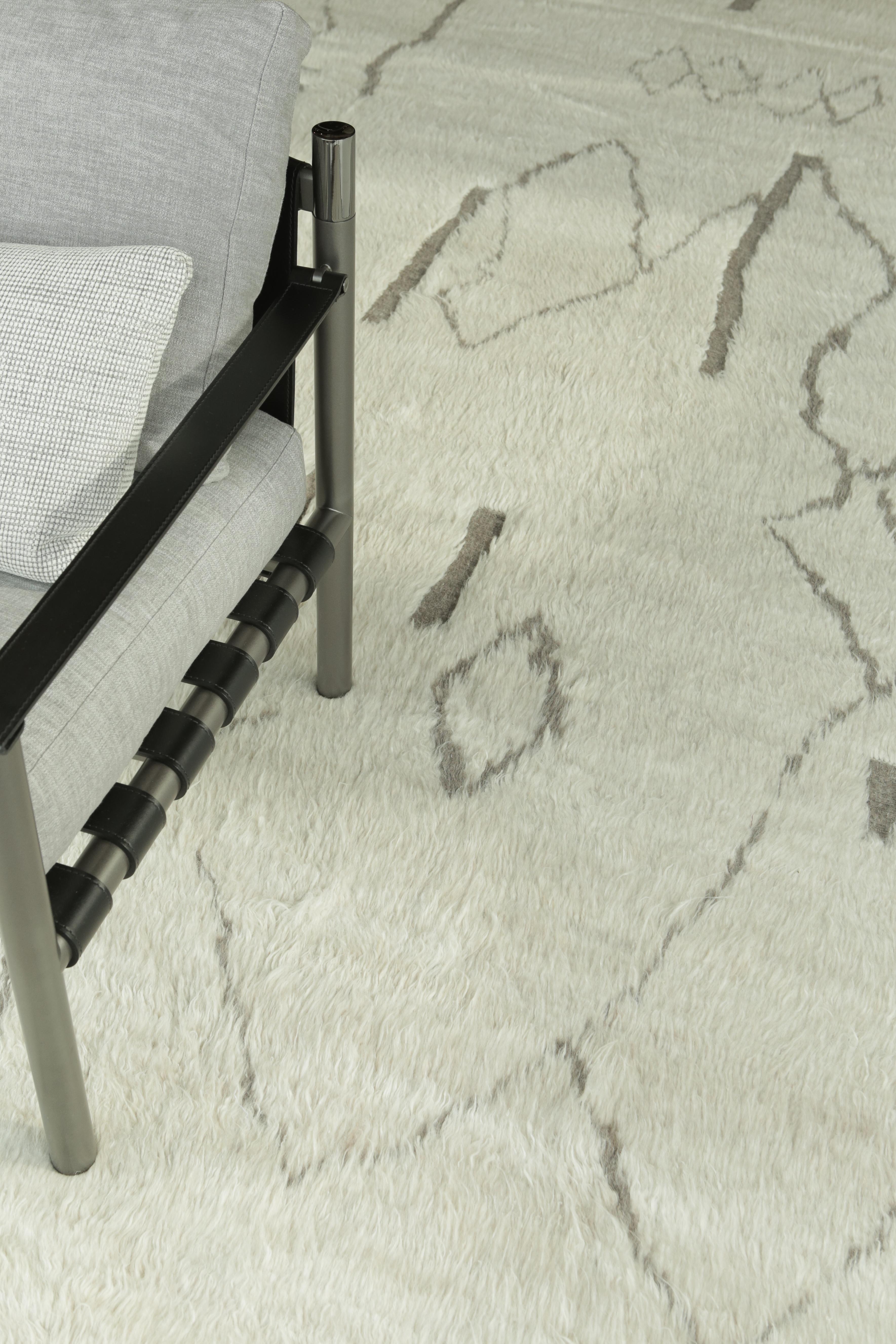 The signature collection of California. Handwoven luxurious wool rug, made of timeless design elements, embossed detailing, and neutral earth tones with the perfect shade of white. Haute Bohemian Collection: designed in Los Angeles named for the