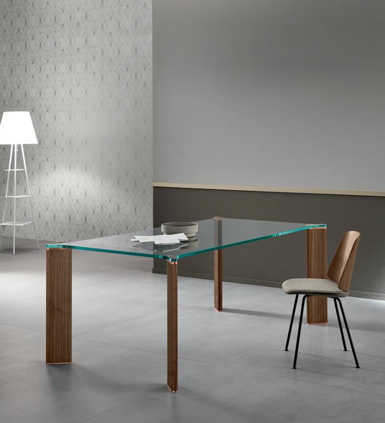 The dining table in stratified glass Can Can is made of a clean and linear structure. The supporting legs are made of glass, too and enhance the shape of the top.

The stratified top of Can Can table can be chosen among a range of dimensions,