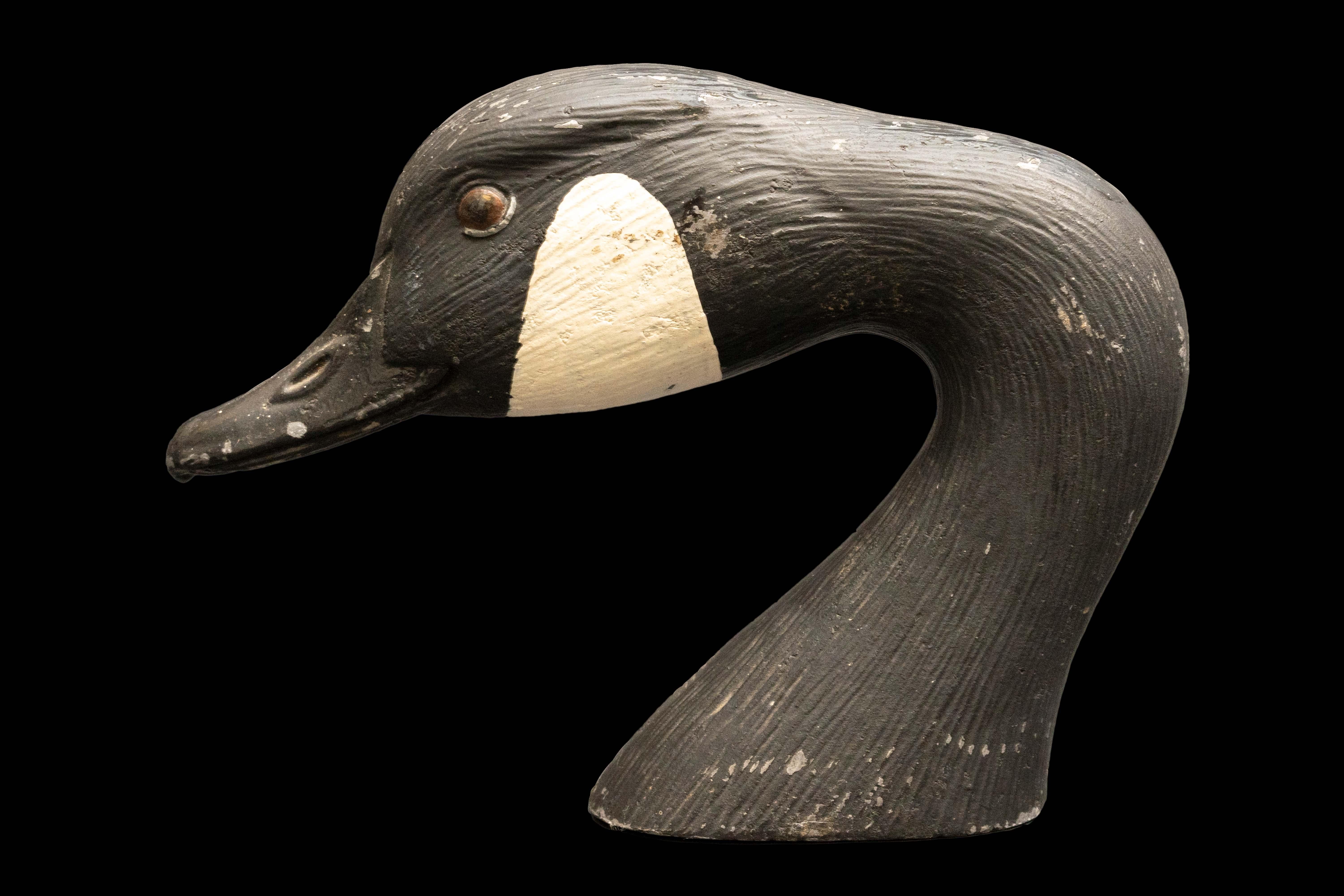 Painted iron Canada goose head sculpture or paperweight. This piece is heavy for its size.

Measures approximately: 8