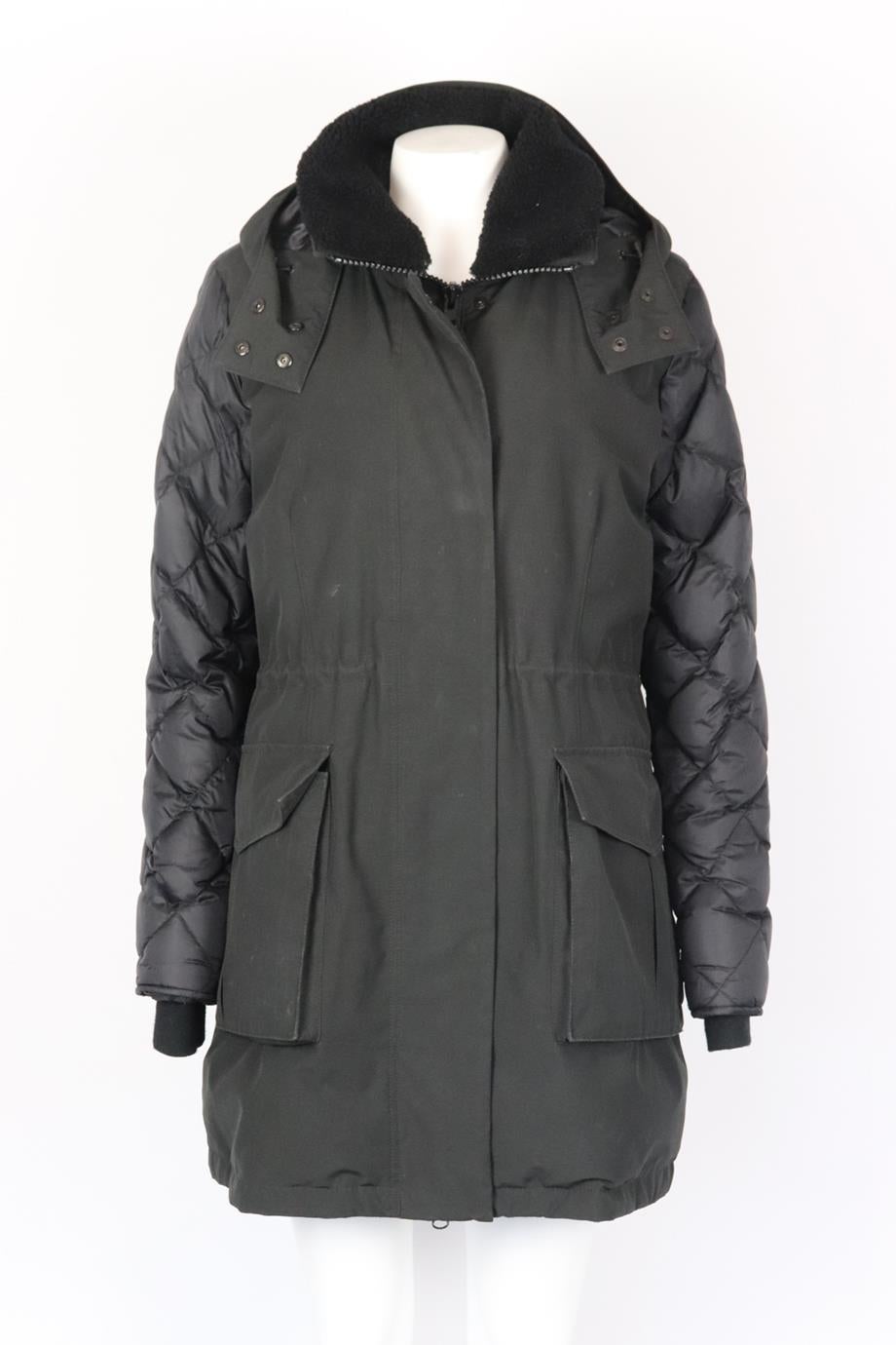 Canada Goose hooded quilted shell down coat. Black. Long sleeve, mock neck. Zip fastening at front. 85% Polyester, 15% cotton; fabric2: 100% nylon; lining: 100% polyester: filling: 80% down, 20% feather padding: 100% polyester. Size: XLarge (UK 14,