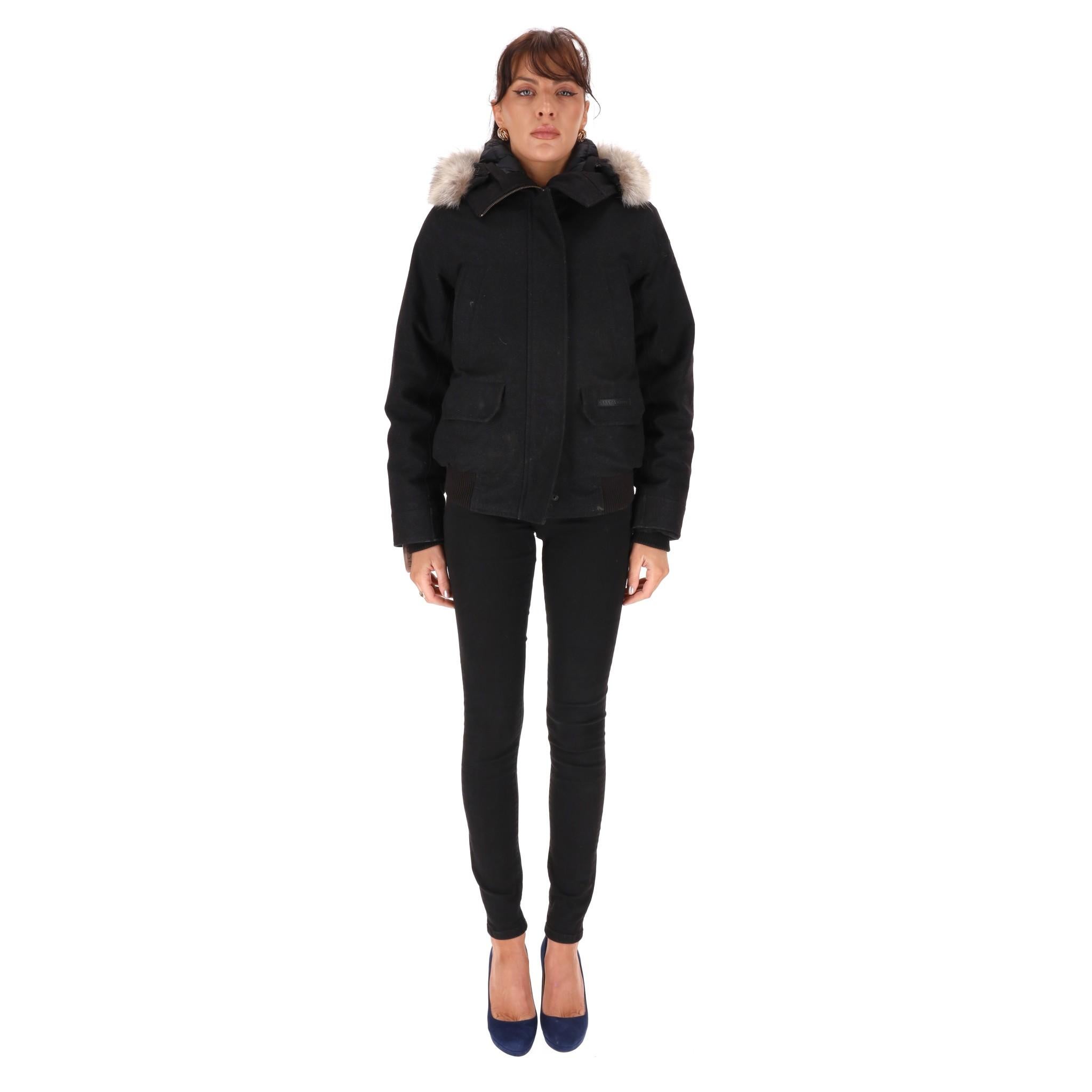 Canada Goose & Loro Piana Wool & Down Bomber Jacket With Coyote Fur Trim

Black bomber jacket crafted from wool with coyote fur trimmed hood, filled with goose down.

Featuring hidden zip fastening along the centre and flap pockets to the
