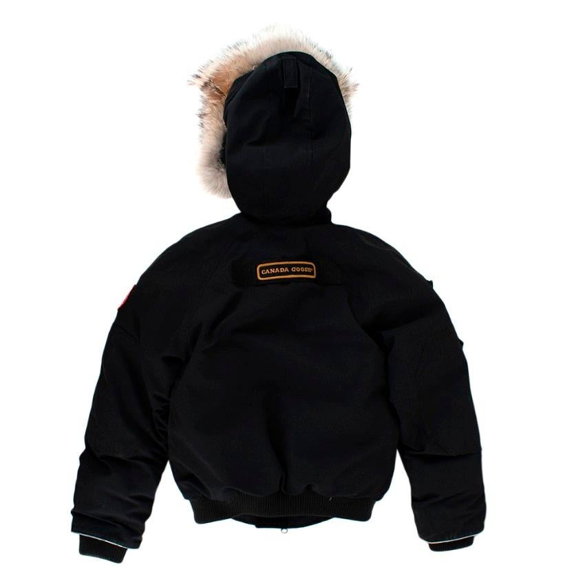 Canada Goose Youth Black Rundle Bomber Jacket w/ Coyote Fur
- Packed with durable warmth that stands up to harsh conditions
- Sporty silhouette
- Crafted in Arctic Tech fabric
- Reinforced elbow patches
- Adjustable tunnel hood for superior