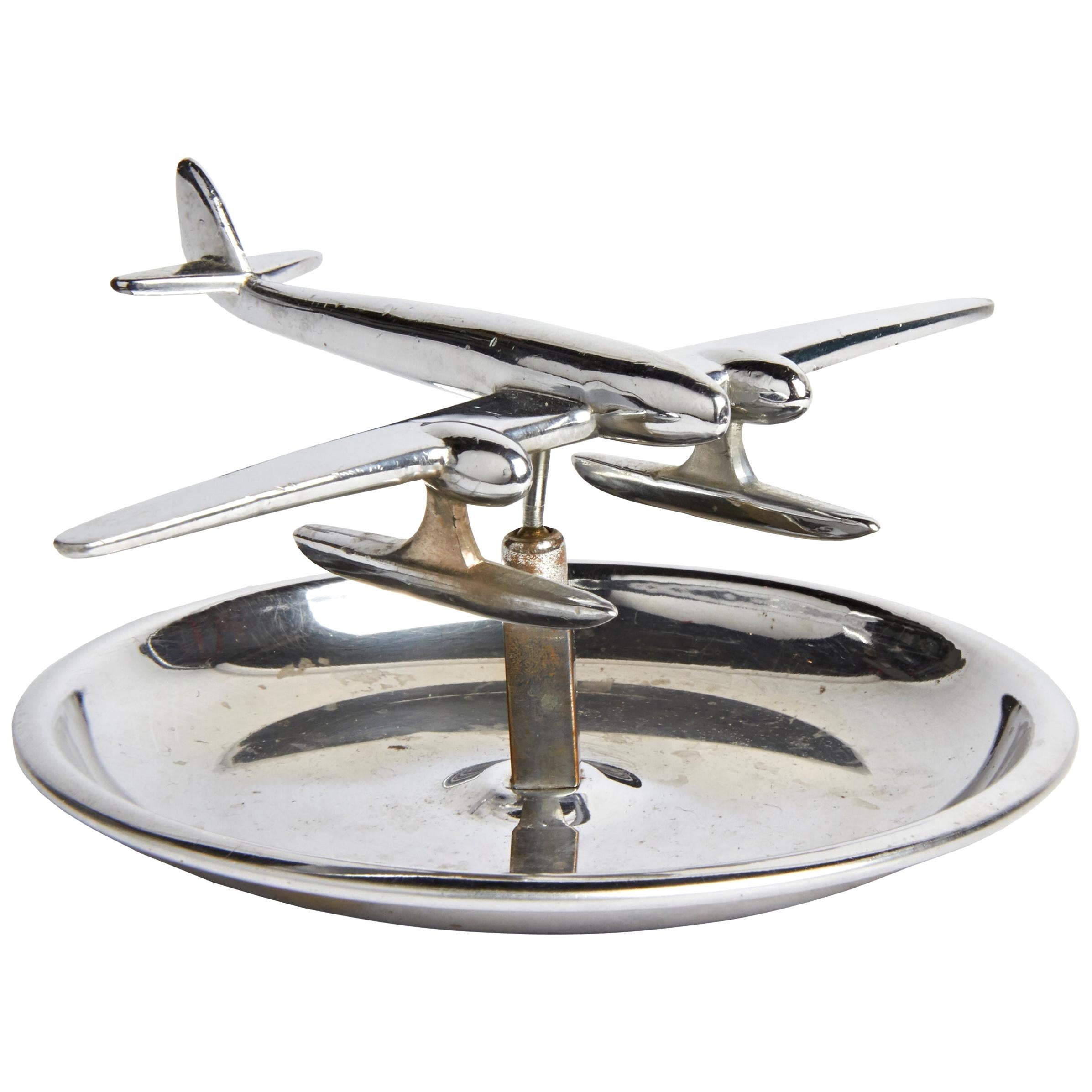 Canadian Art Deco Chrome Figurative Ashtray with Articulated Seaplane 