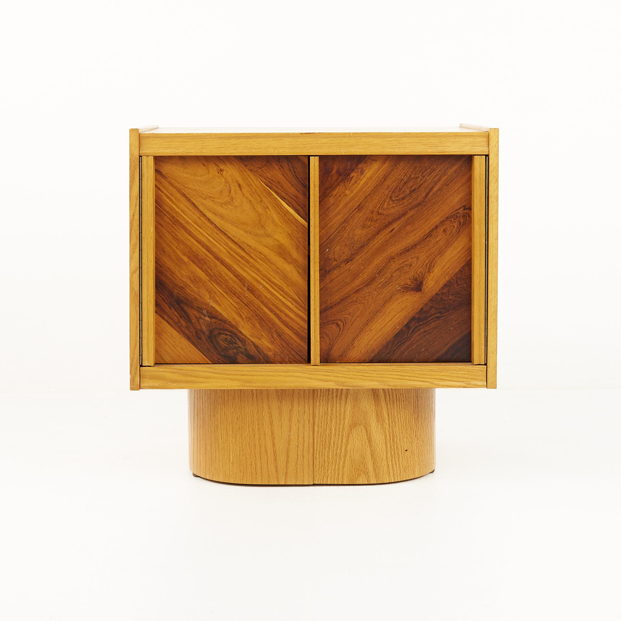 Canadian Brutalist Mid Century Oak and Rosewood Nightstand

Nightstand measures: 25 wide x 17 deep x 25 inches high

This price includes getting this piece in what we call restored vintage condition. That means the piece is permanently fixed upon