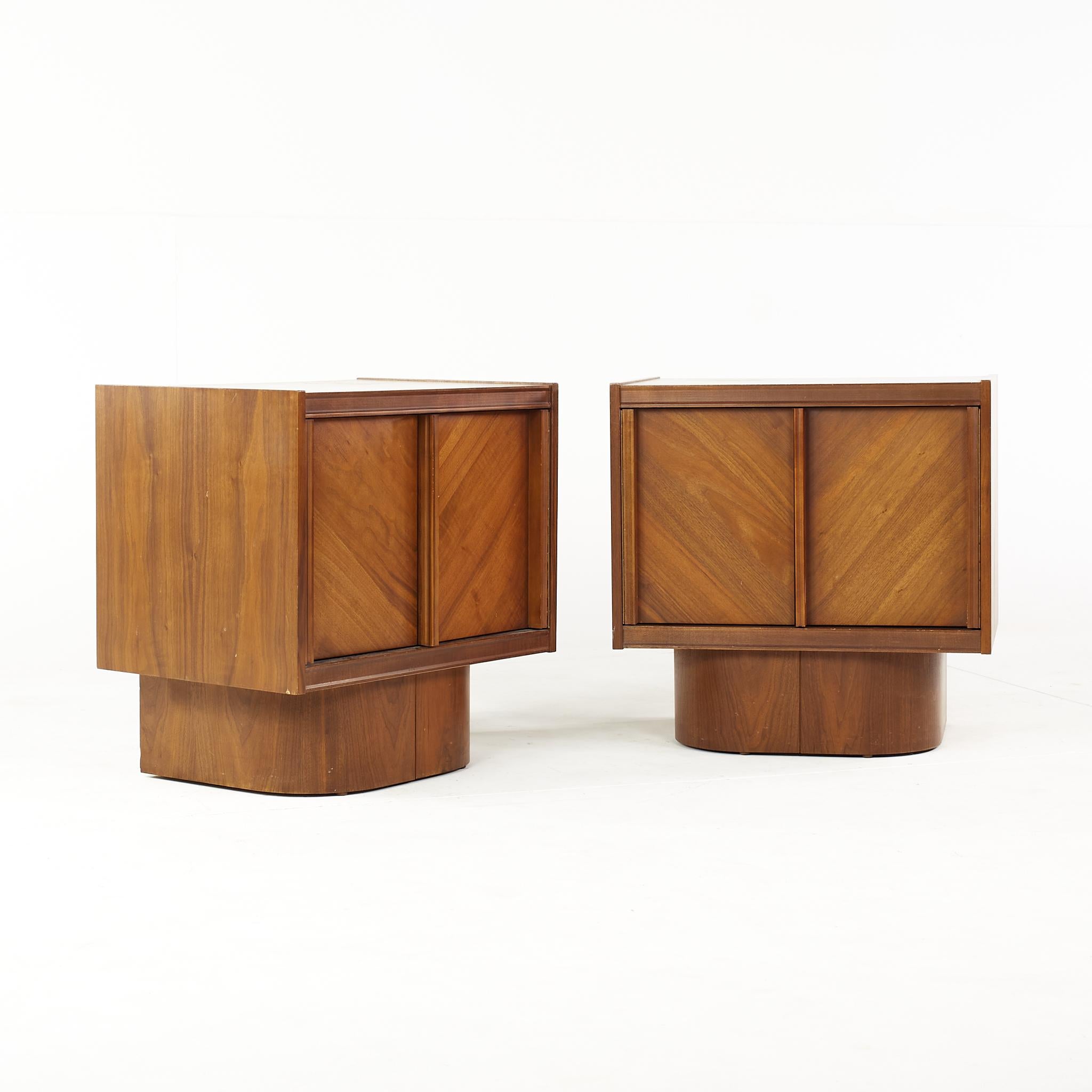 Canadian Brutalist mid century walnut nightstands - pair

This nightstand measures: 25 wide x 17 deep x 25 inches high

All pieces of furniture can be had in what we call restored vintage condition. That means the piece is restored upon purchase