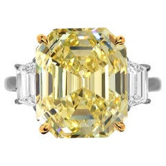 Used Canadian GIA Certified Fancy Intense Yellow 7 Carat Emerald Cut Diamond Ring