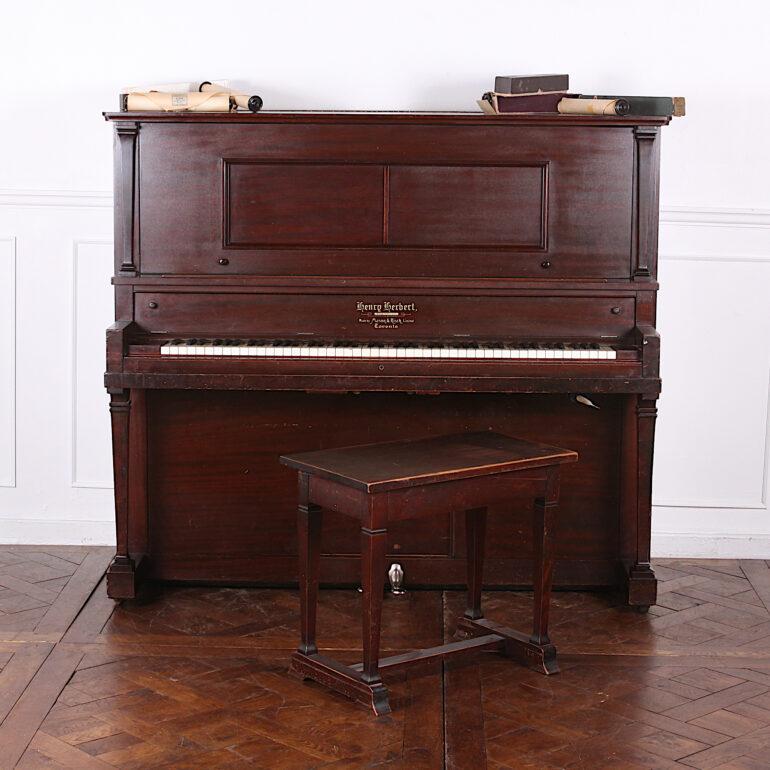 An Edwardian Canadian made mahogany-case player piano with aprox 50 music rolls, playable either as by pumping the foot pedals with one of the recorded rolls, or also as a regular piano. One owner from the original Victoria family who purchased this